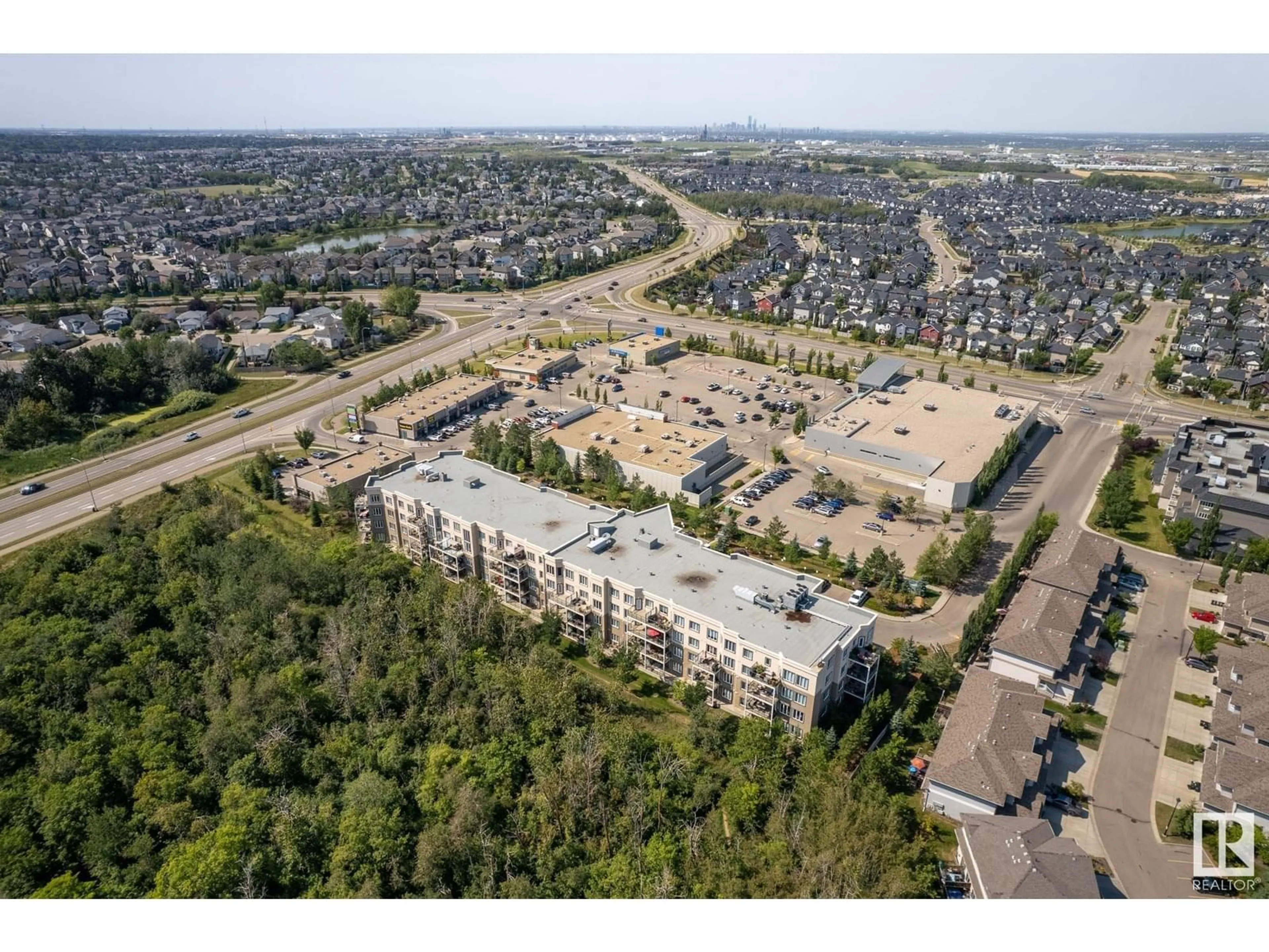 A pic from outside/outdoor area/front of a property/back of a property/a pic from drone, street for #311 - 4075 CLOVER BAR RD, Sherwood Park Alberta T8H0R6