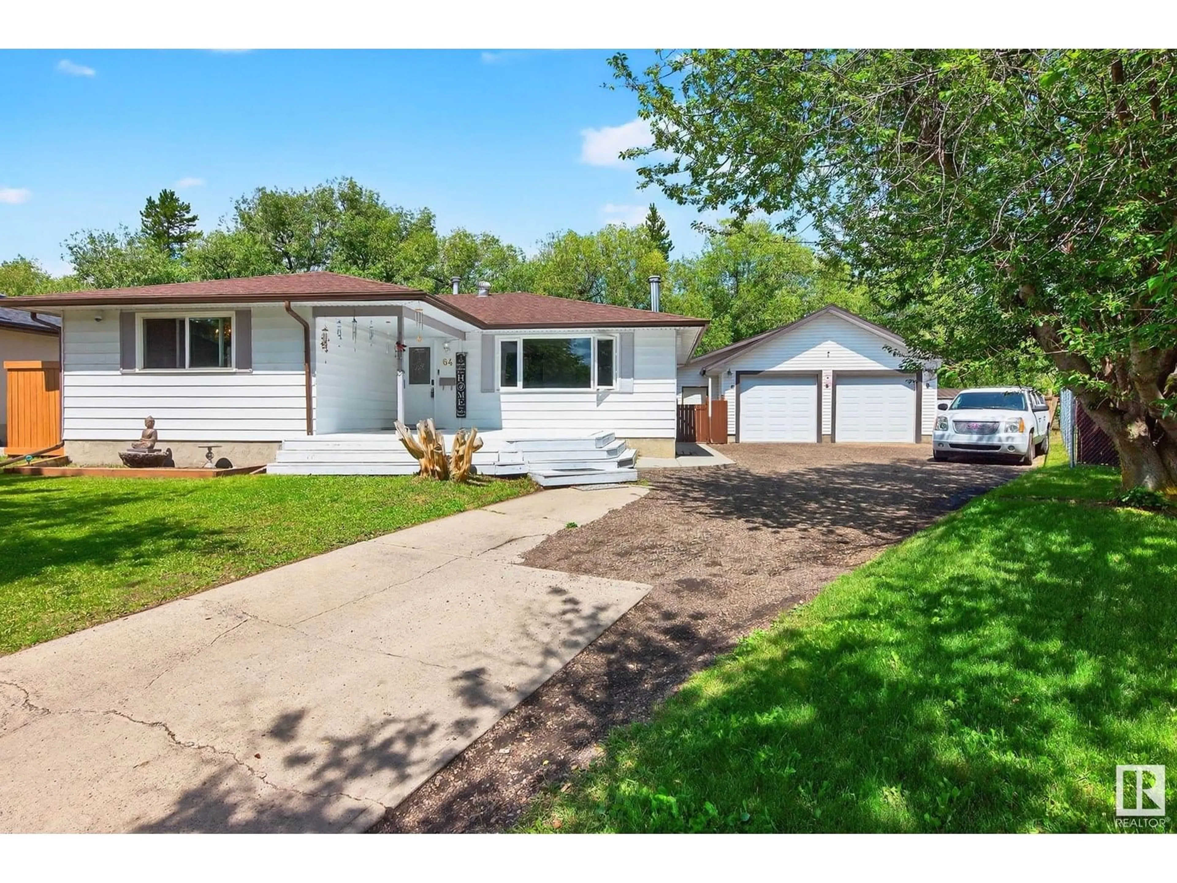 Home with vinyl exterior material, street for 64 ASPEN CR, St. Albert Alberta T8N2L8