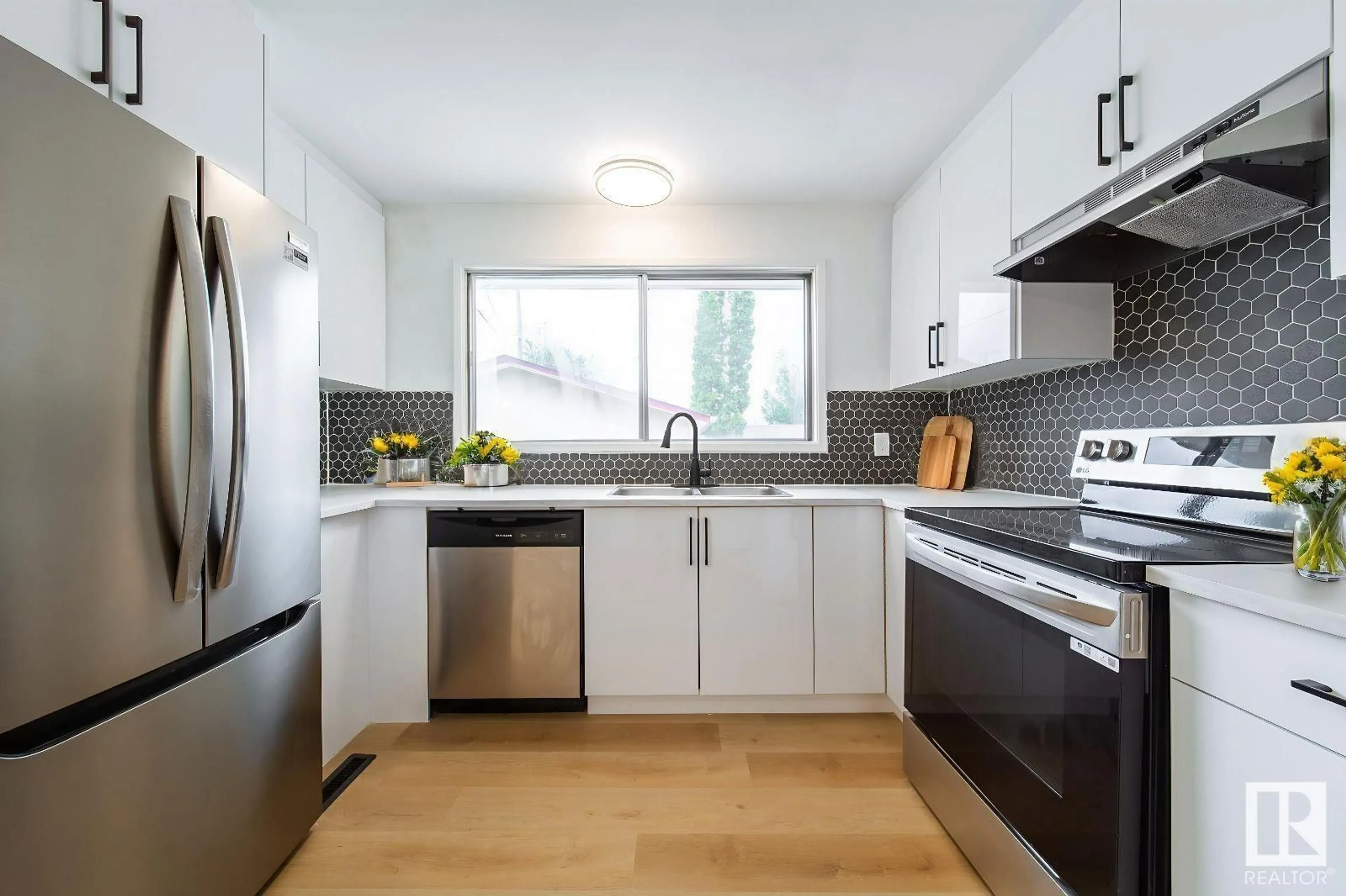 Open concept kitchen, unknown for 6708 132 AV, Edmonton Alberta T5C2A5