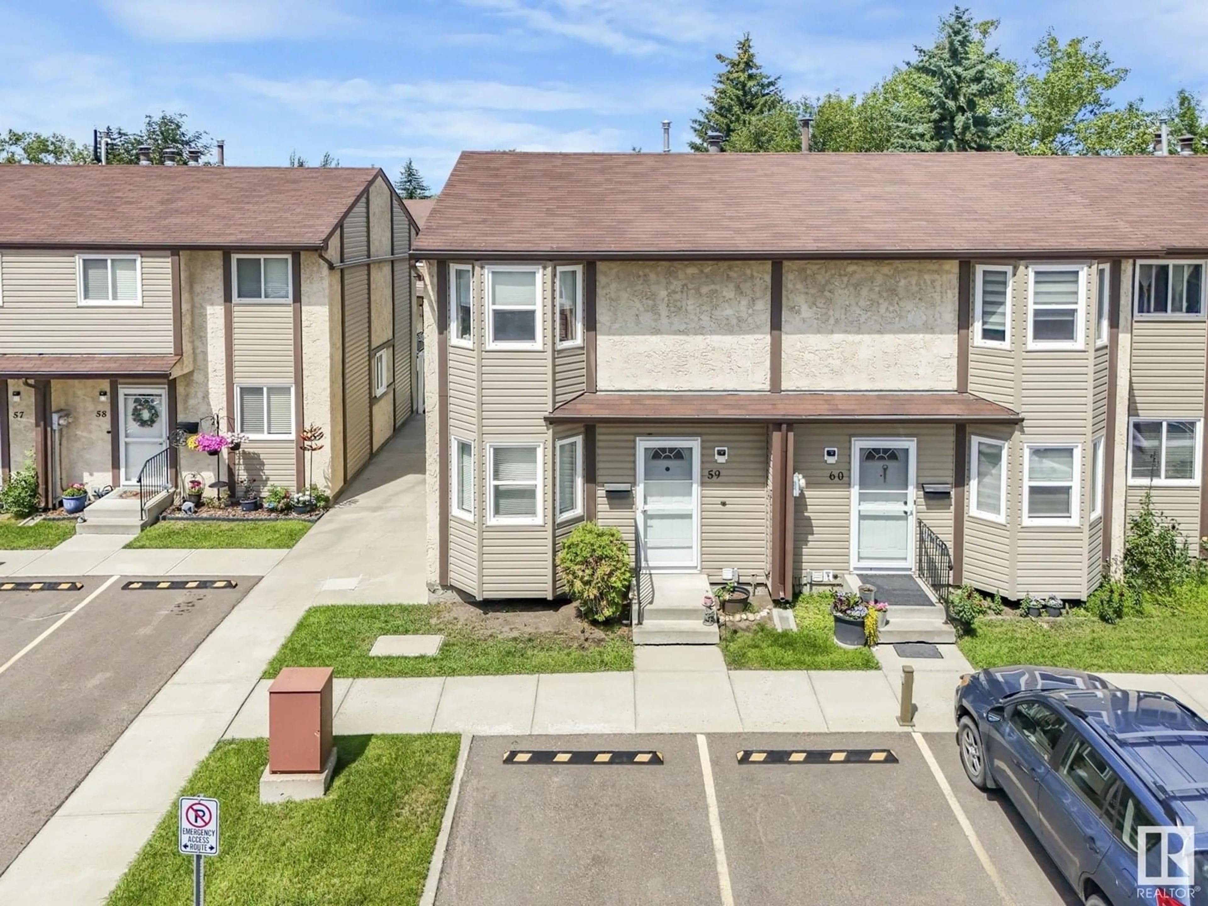 A pic from outside/outdoor area/front of a property/back of a property/a pic from drone, street for 59 - 10453 20 AV, Edmonton Alberta T6J5H1
