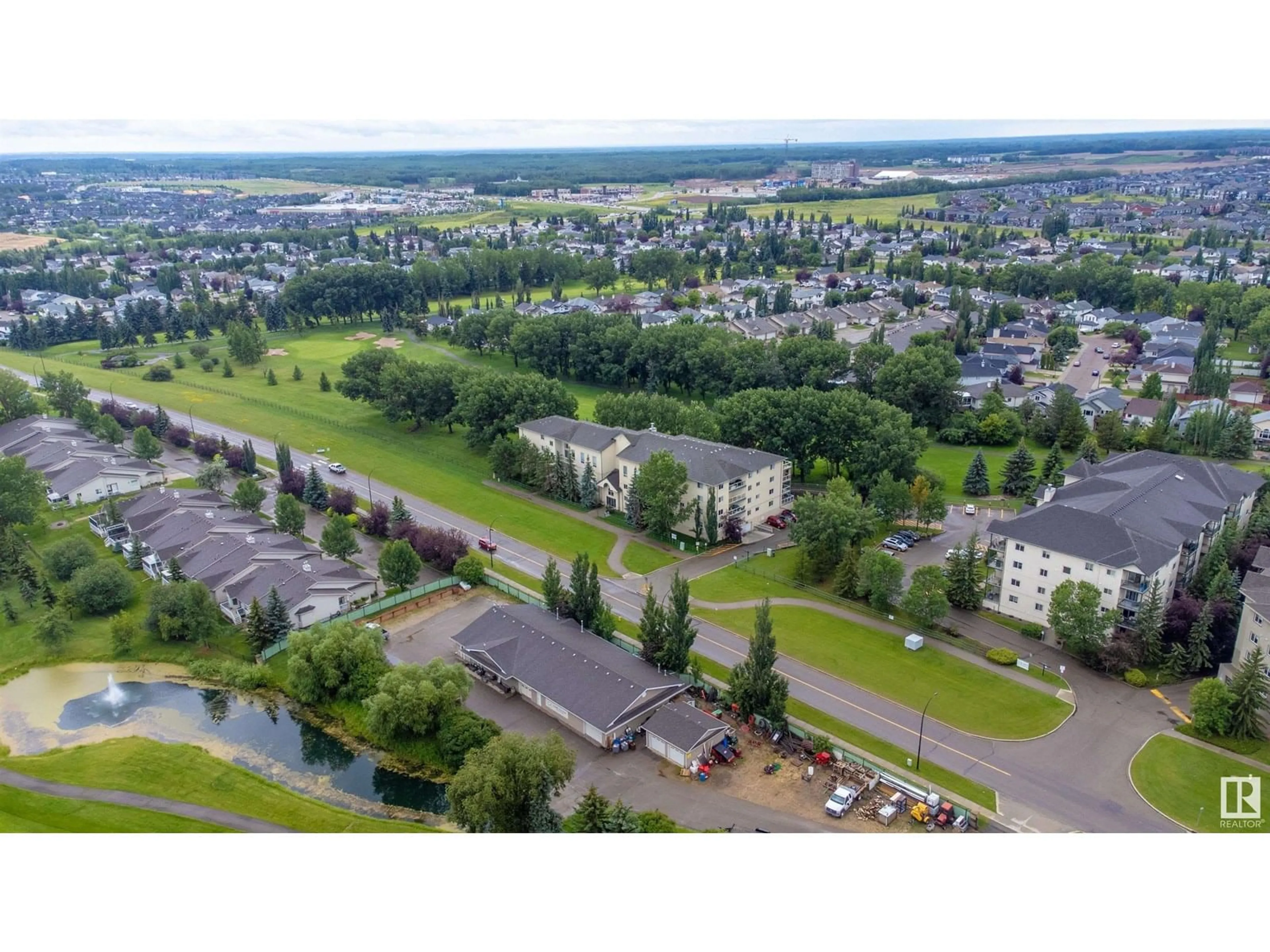 A pic from outside/outdoor area/front of a property/back of a property/a pic from drone, mountain view for #307 - 260 LEWIS ESTATES BOULEVARD NW, Edmonton Alberta T5T3Y4