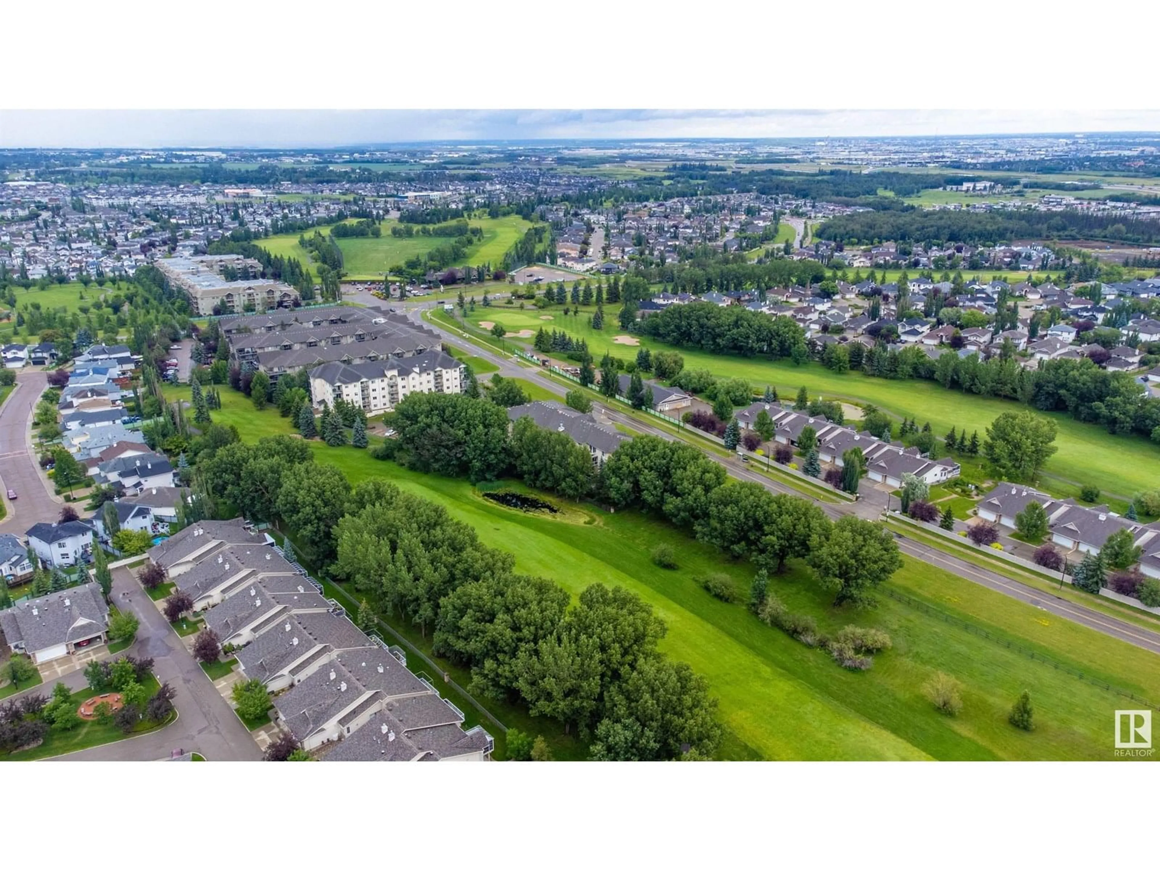 A pic from outside/outdoor area/front of a property/back of a property/a pic from drone, mountain view for #307 - 260 LEWIS ESTATES BOULEVARD NW, Edmonton Alberta T5T3Y4
