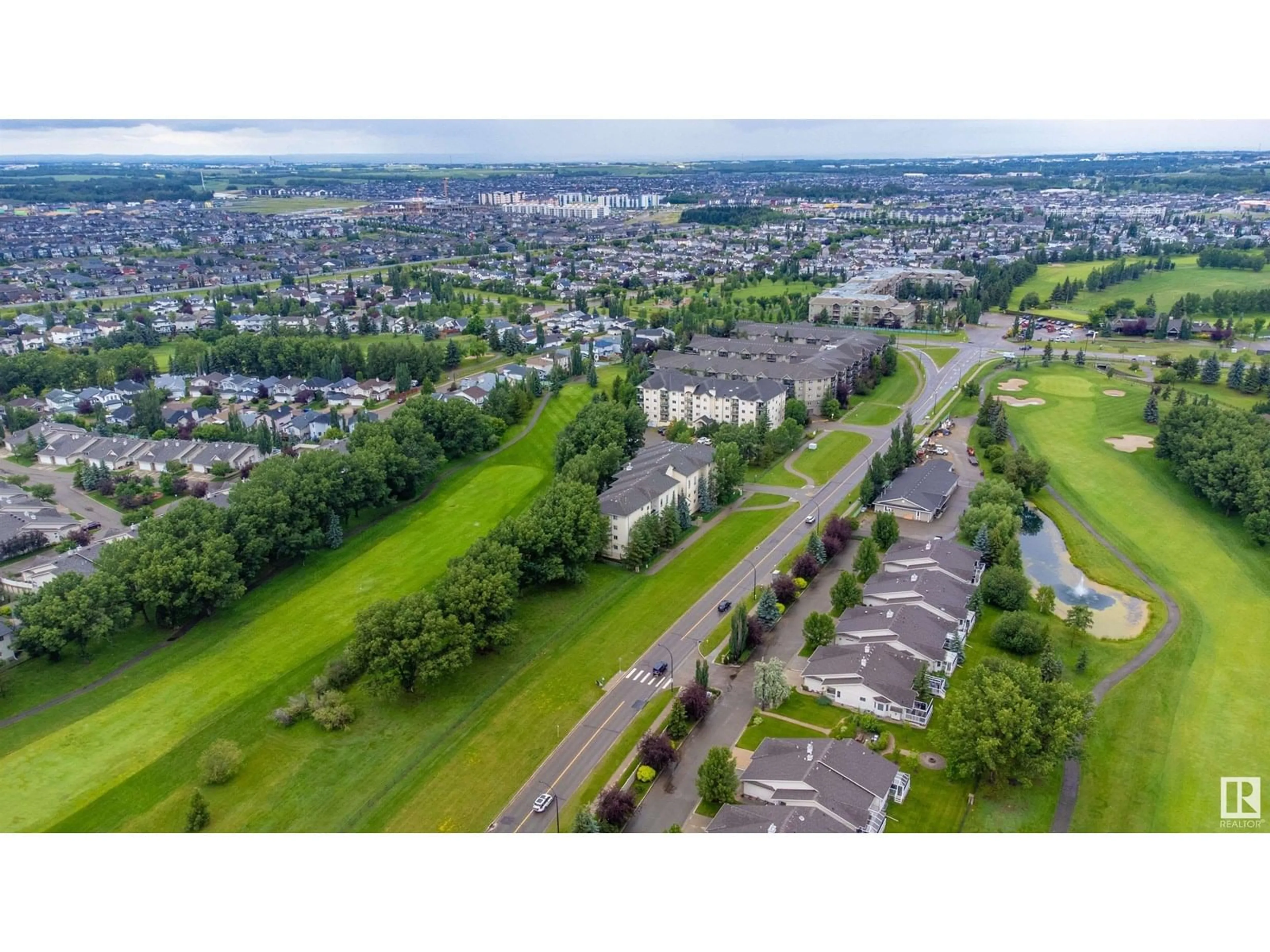 A pic from outside/outdoor area/front of a property/back of a property/a pic from drone, mountain view for #307 - 260 LEWIS ESTATES BOULEVARD NW, Edmonton Alberta T5T3Y4