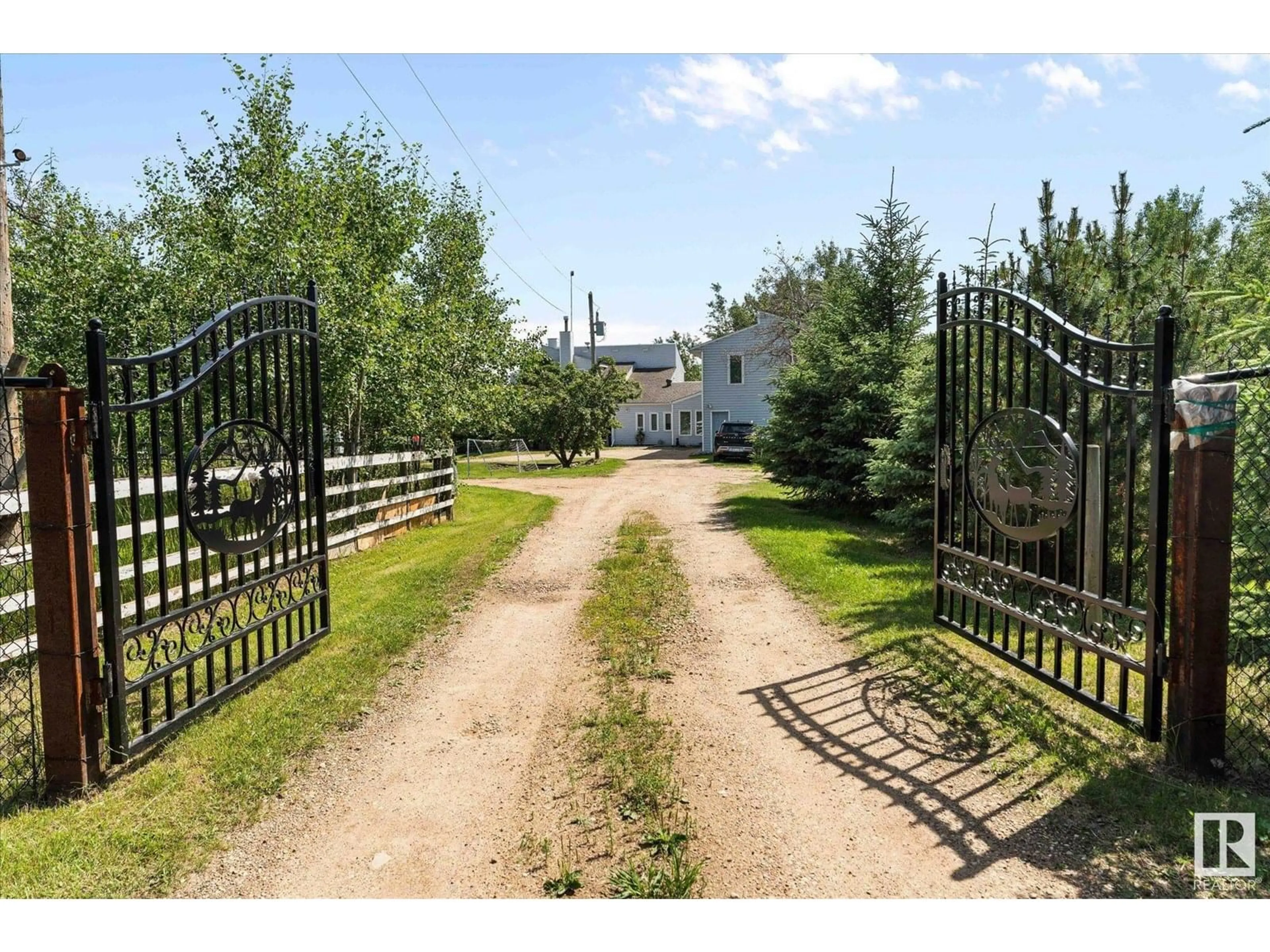 A pic from outside/outdoor area/front of a property/back of a property/a pic from drone, street for 20339 TWP ROAD 550, Rural Strathcona County Alberta T8L4B6