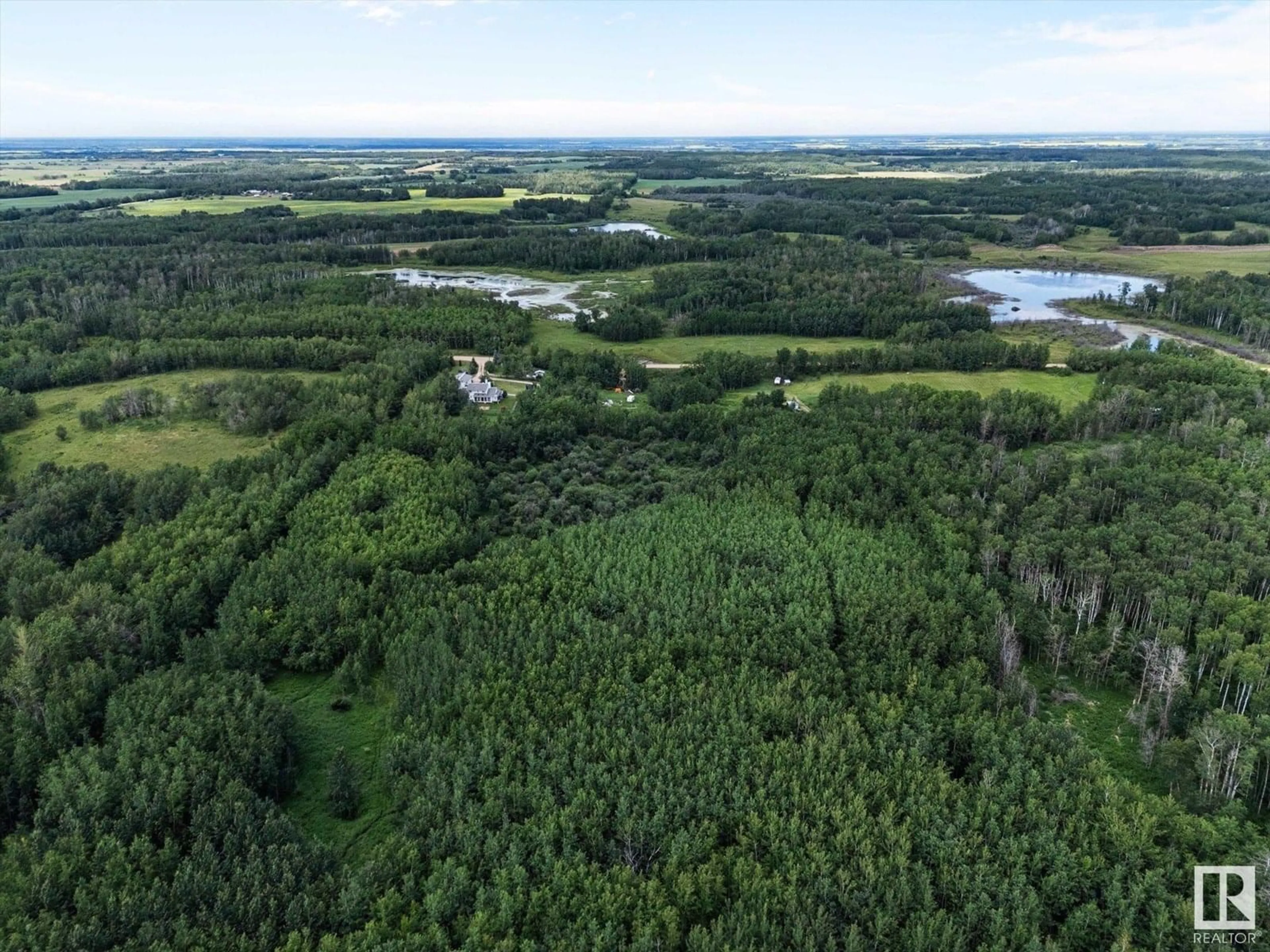 A pic from outside/outdoor area/front of a property/back of a property/a pic from drone, forest/trees view for 20339 TWP ROAD 550, Rural Strathcona County Alberta T8L4B6
