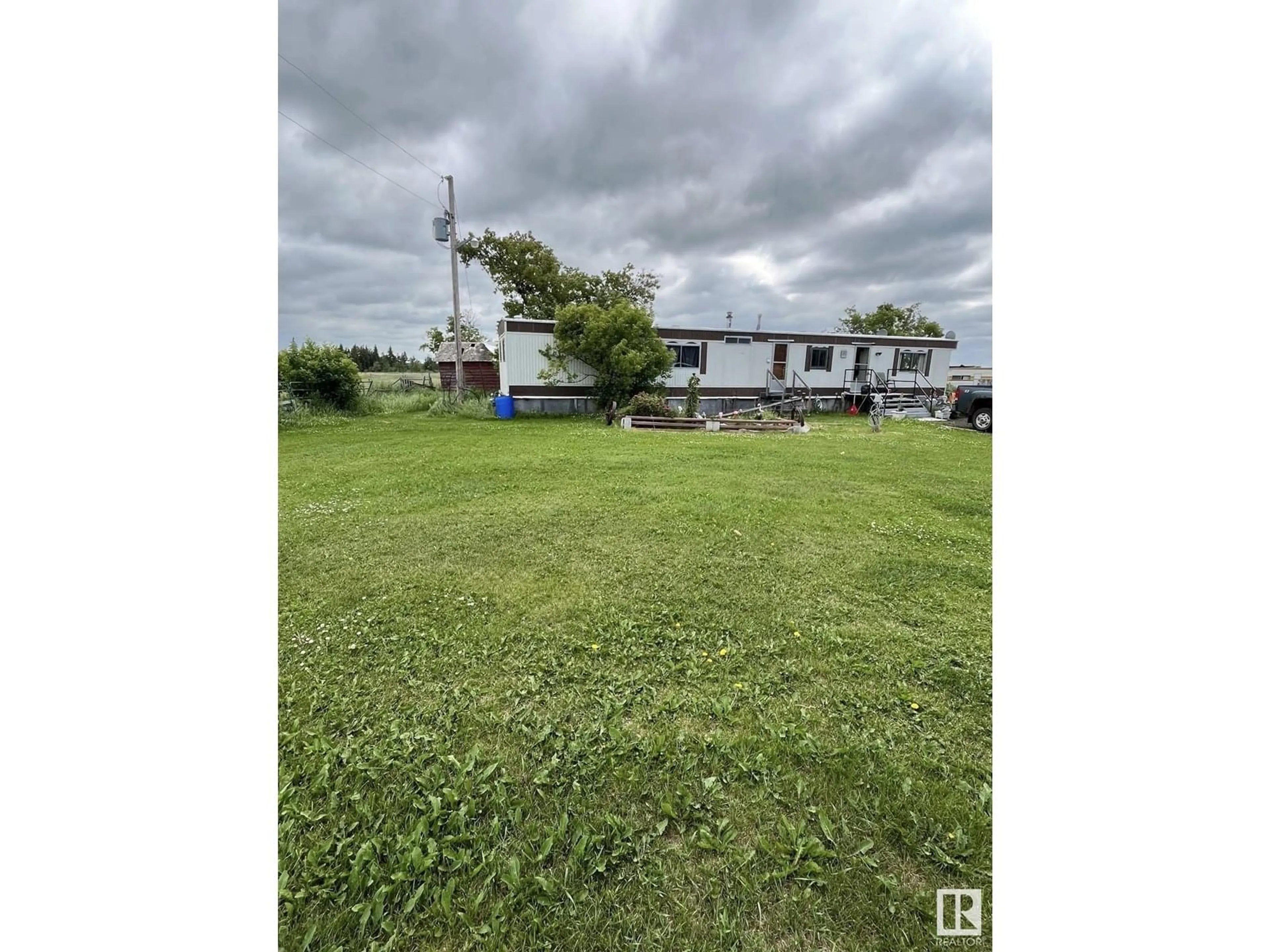 A pic from outside/outdoor area/front of a property/back of a property/a pic from drone, unknown for 56519A HWY 33, Rural Lac Ste. Anne County Alberta T0E1X0