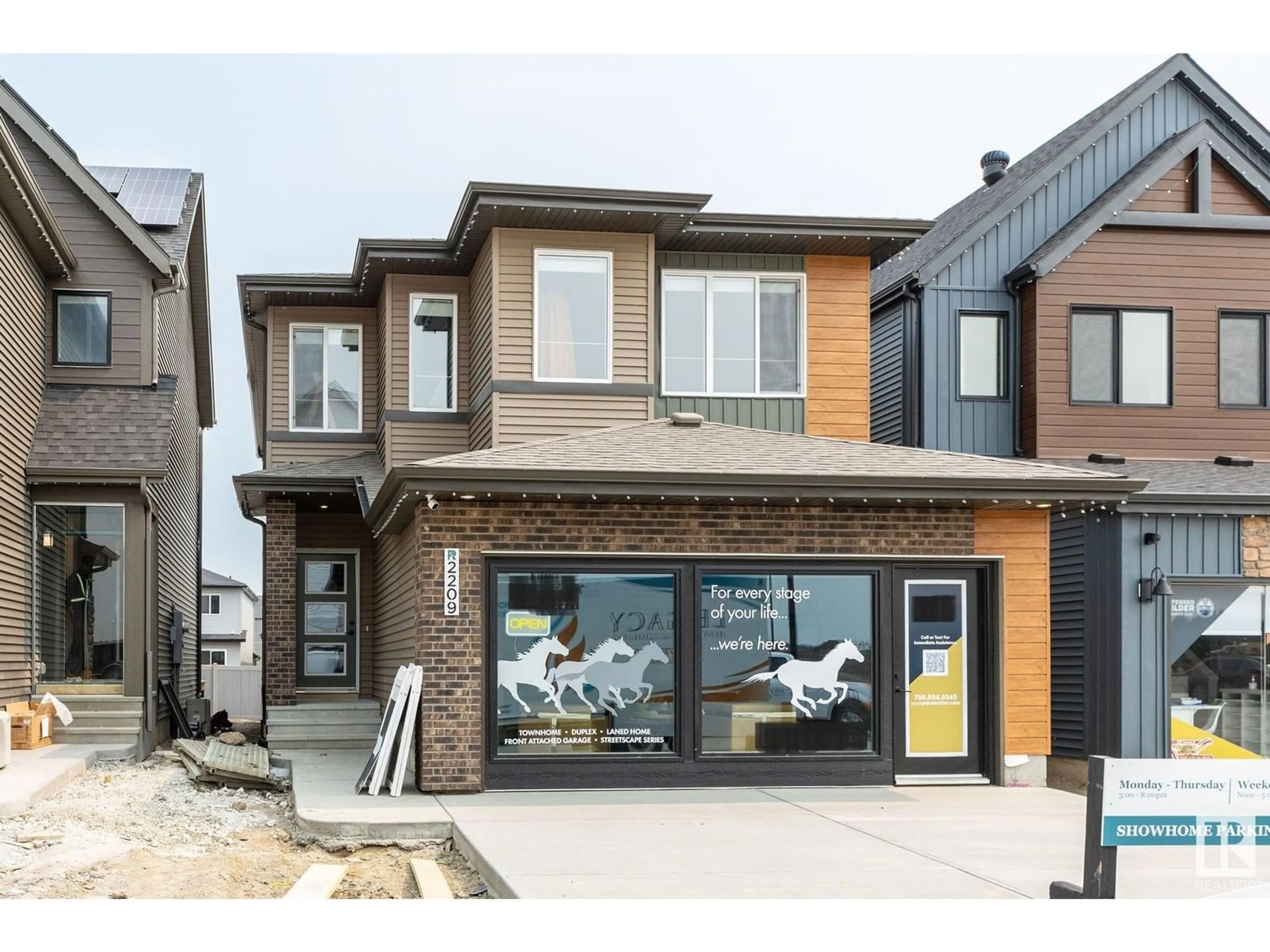 Home with brick exterior material, street for NW - 2209 192A ST, Edmonton Alberta T6M3B6