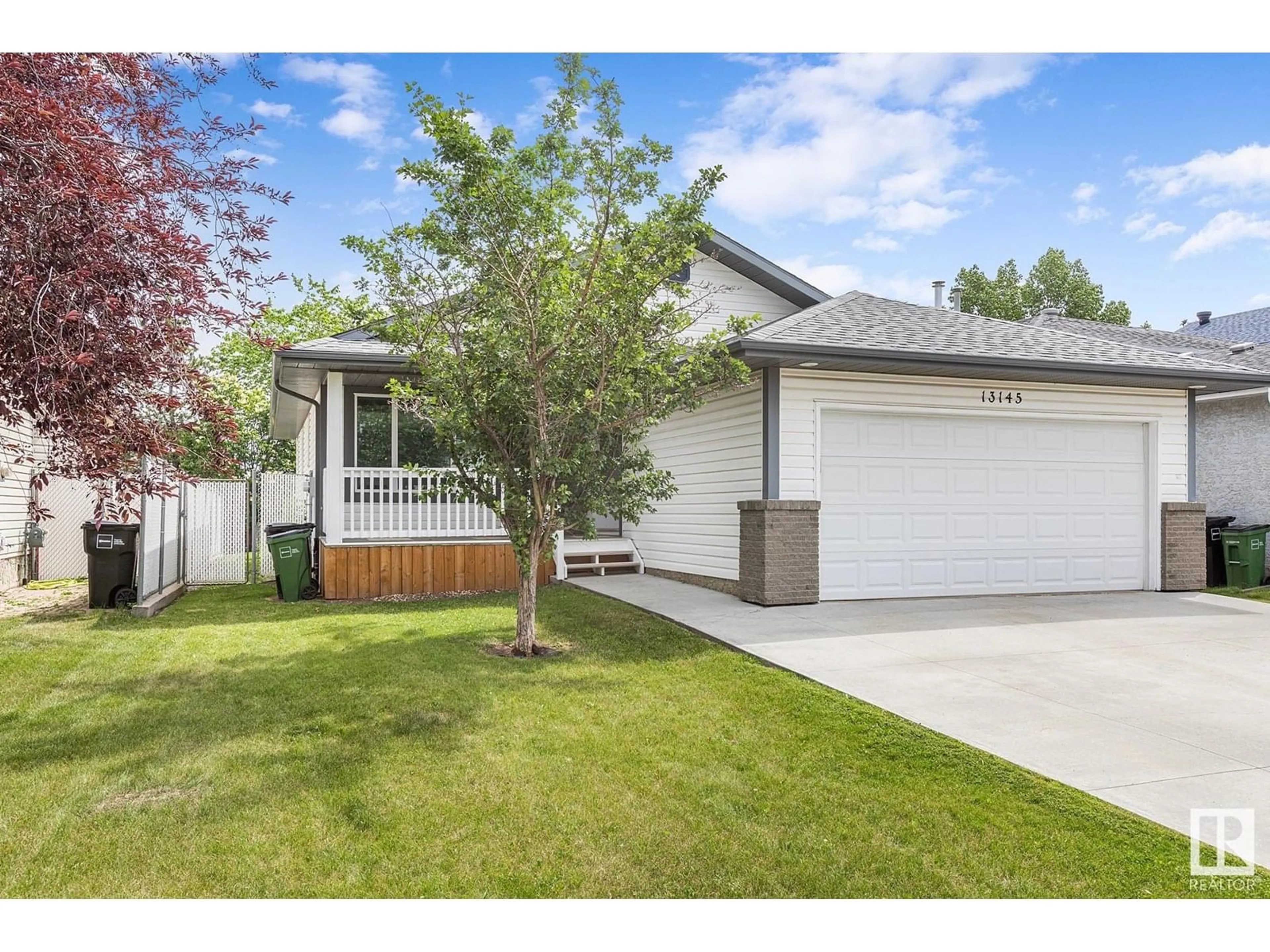 Home with vinyl exterior material, street for NW - 13145 137 ST, Edmonton Alberta T5L5A1