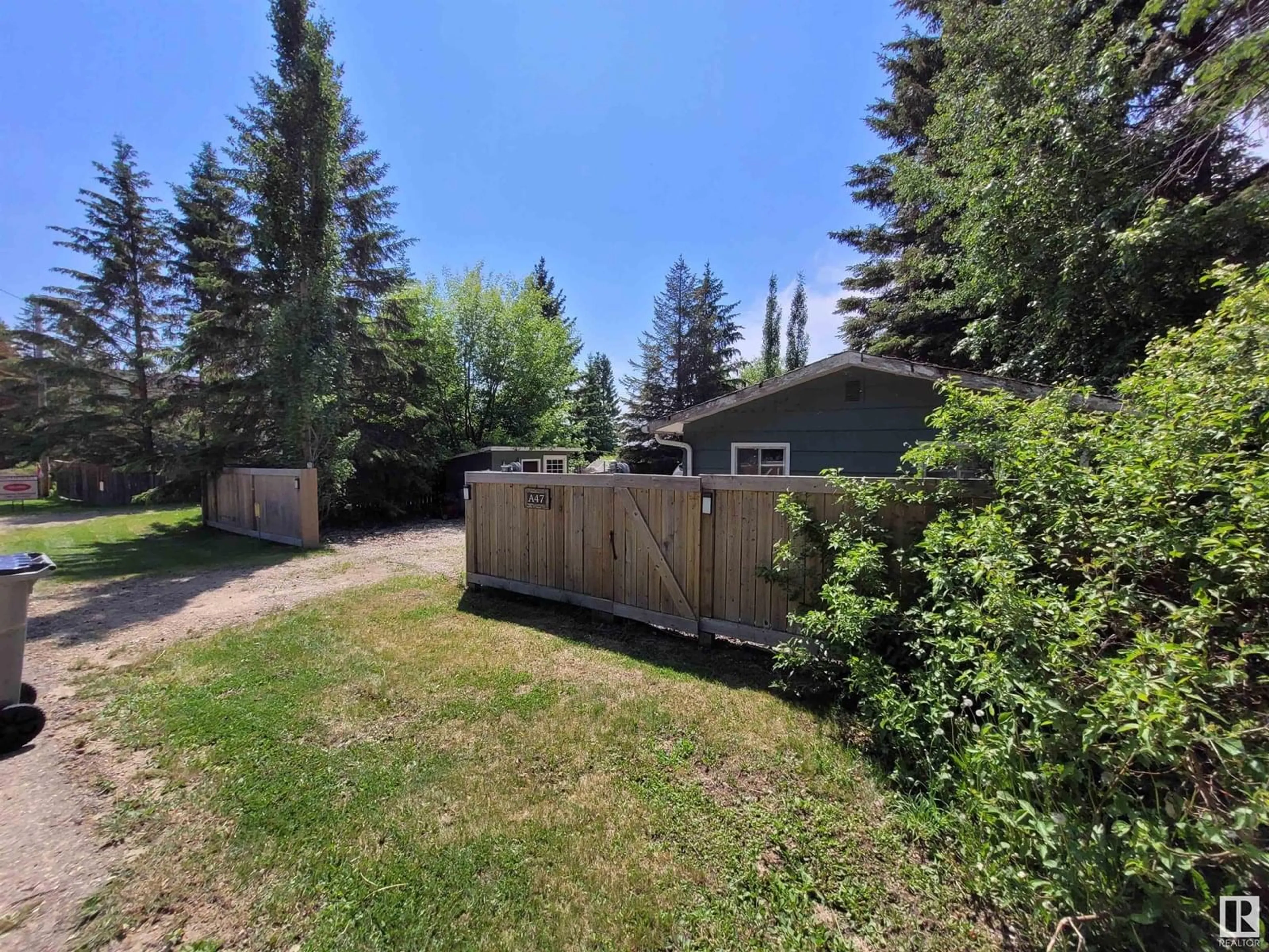 A pic from outside/outdoor area/front of a property/back of a property/a pic from drone, forest/trees view for 47 JOHNSONIA BEACH, Rural Leduc County Alberta T0C2P0