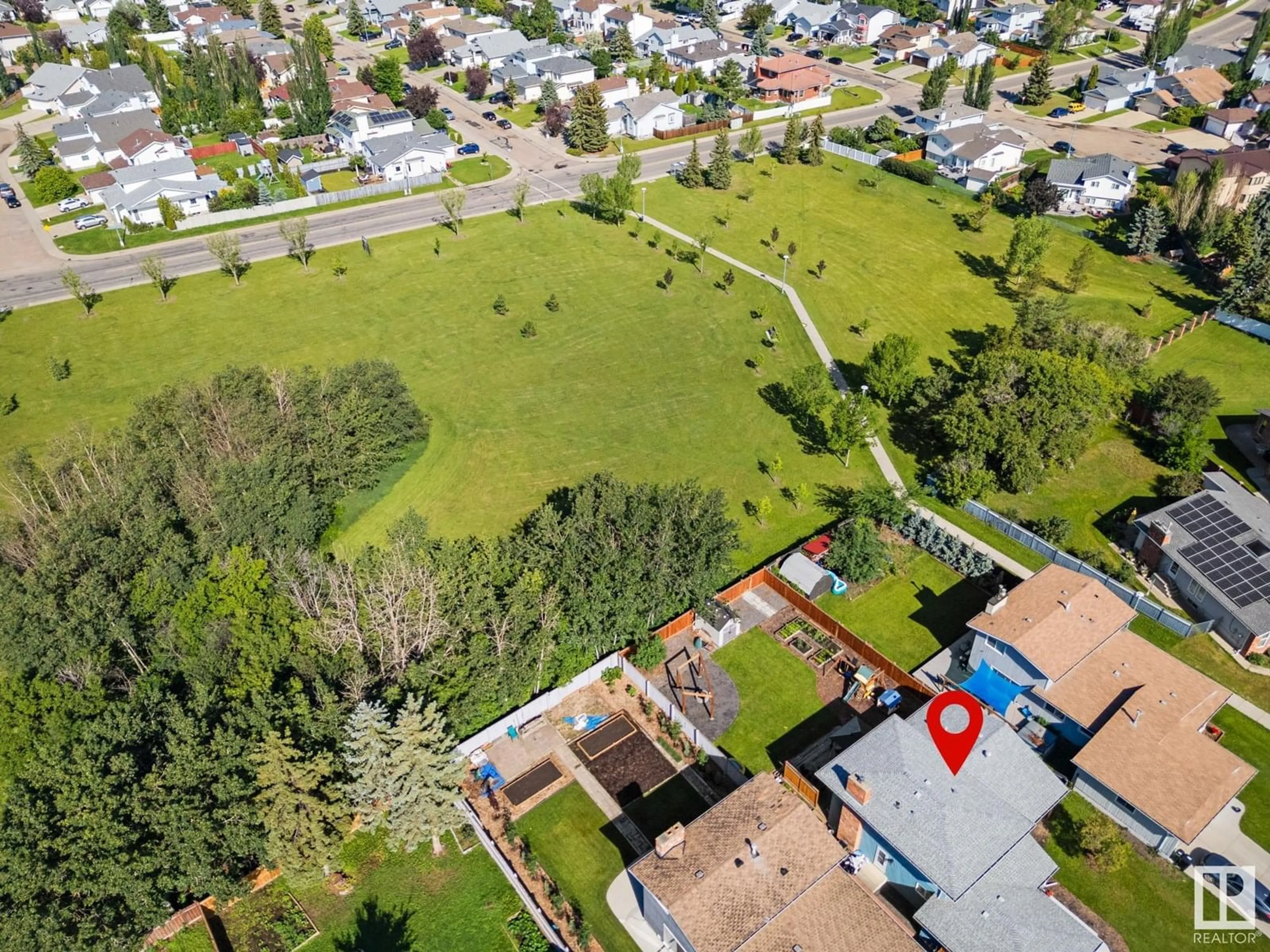 A pic from outside/outdoor area/front of a property/back of a property/a pic from drone, street for 9012 187 ST, Edmonton Alberta T5T1S2