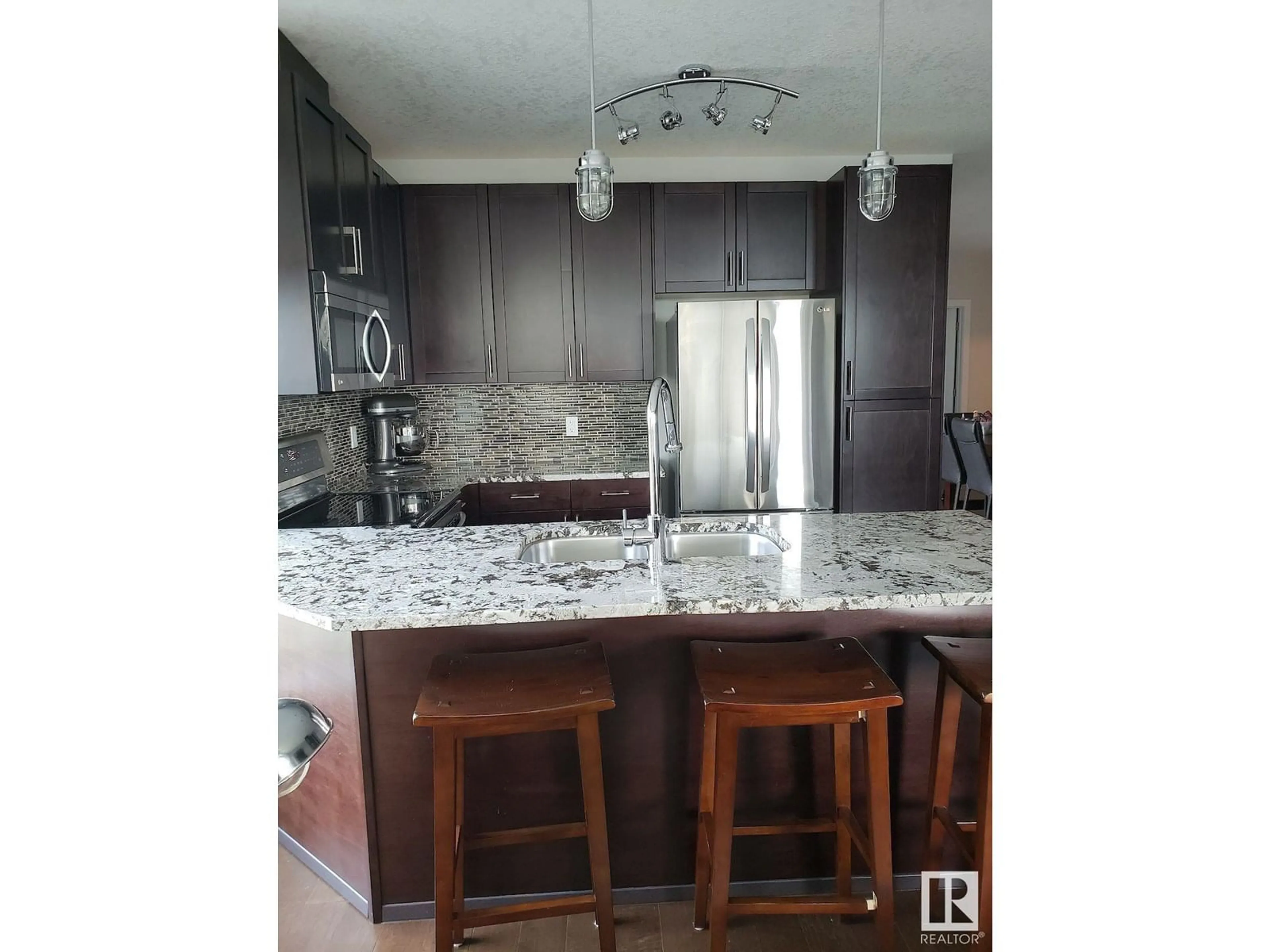 Open concept kitchen, unknown for #416 - 5151 WINDERMERE BV, Edmonton Alberta T6W2K4