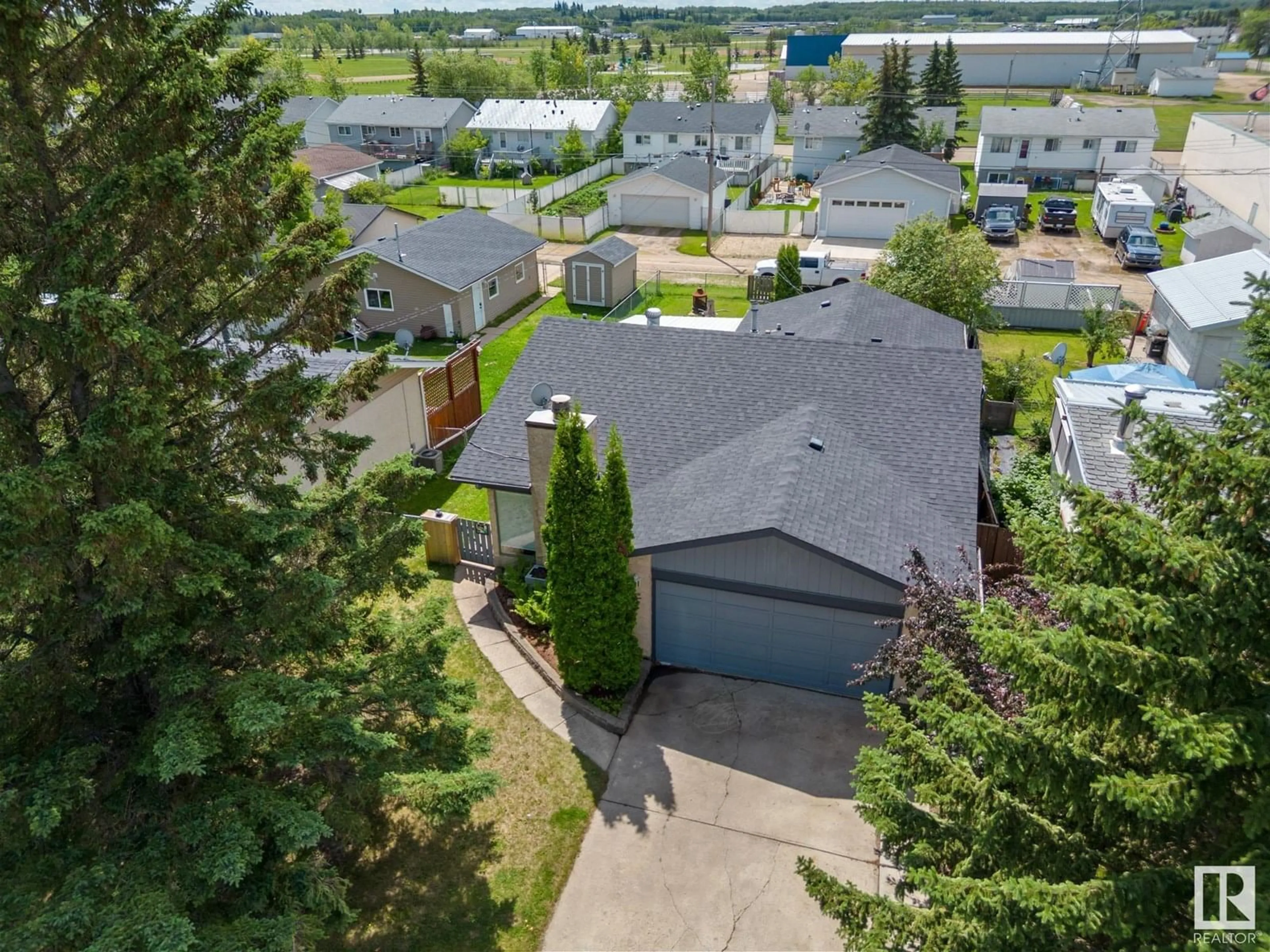 A pic from outside/outdoor area/front of a property/back of a property/a pic from drone, street for 4751 56 AVE, Tofield Alberta T0B4J0