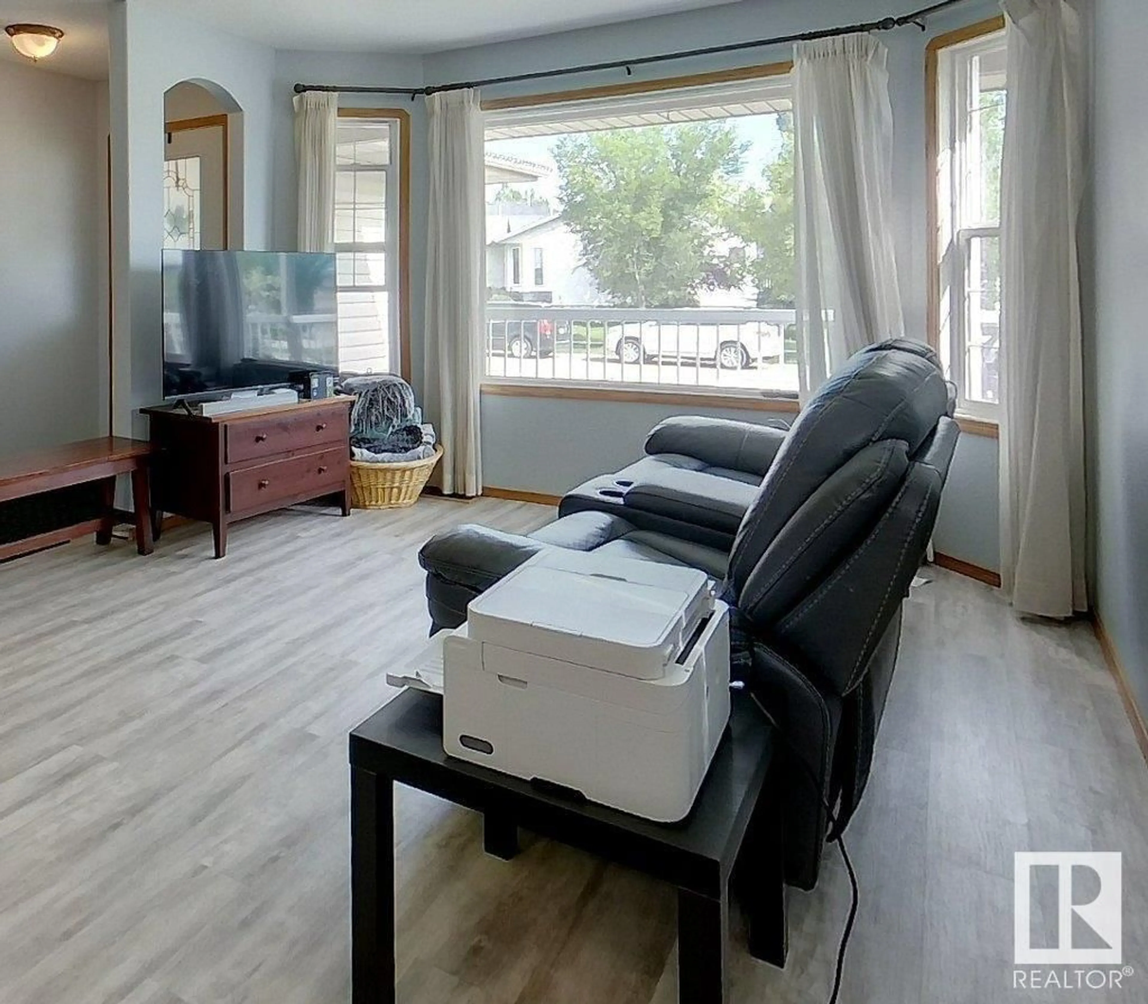Living room with furniture, unknown for 6403 30 AVE, Camrose Alberta T4V4V7