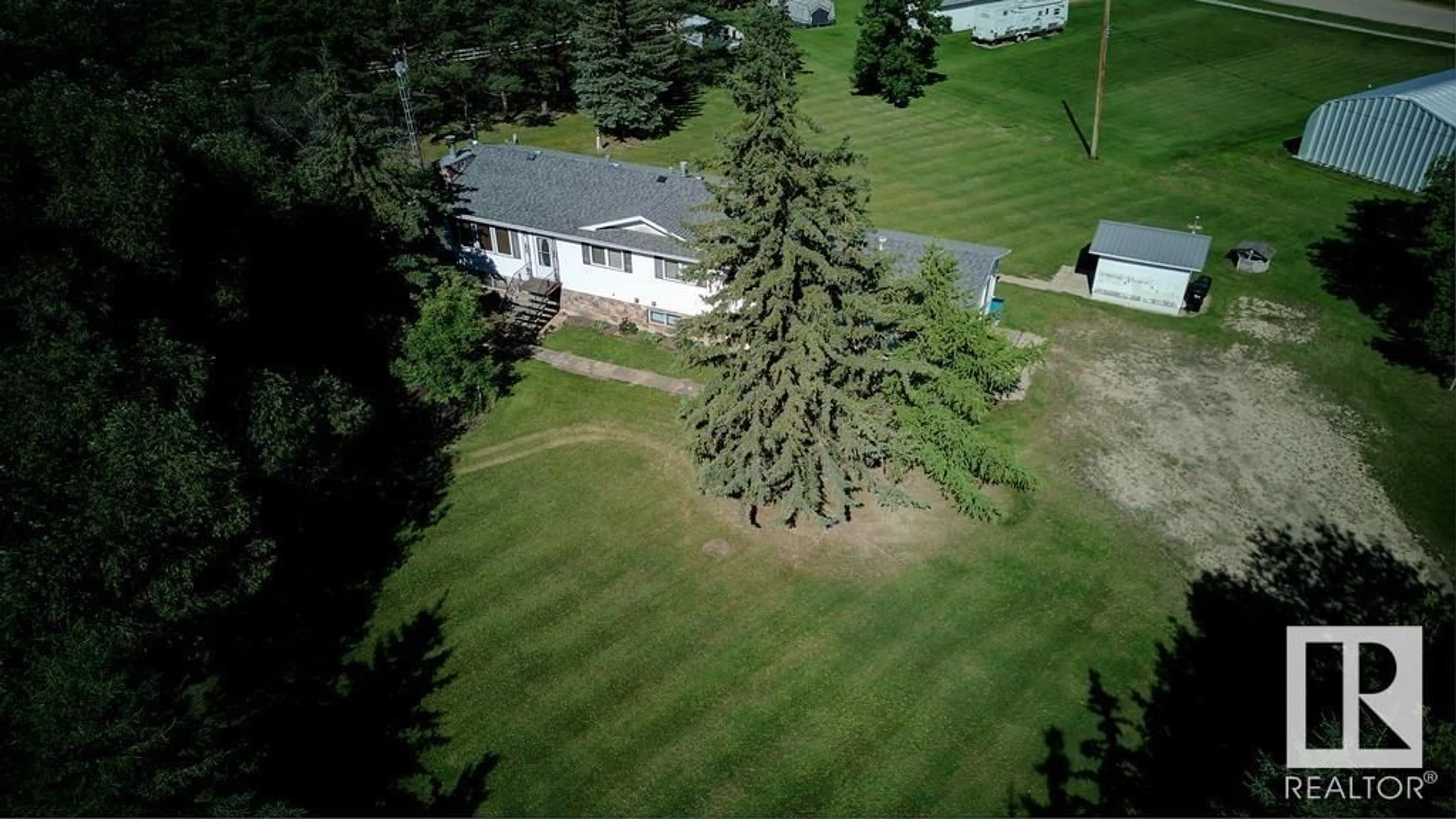 A pic from outside/outdoor area/front of a property/back of a property/a pic from drone, unknown for 5001 50 ST, Rural Westlock County Alberta T0G0S0