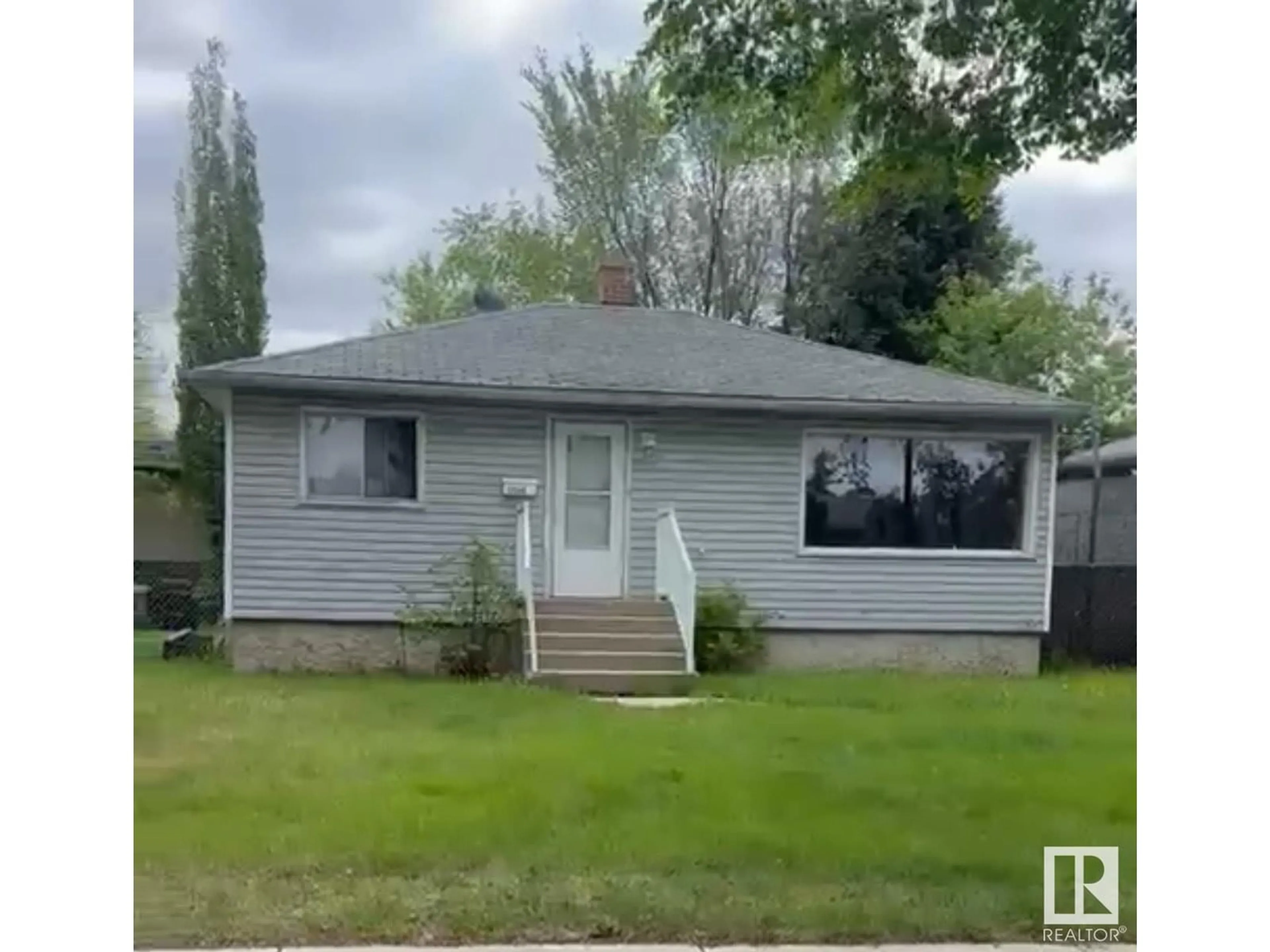 Home with vinyl exterior material, street for NW - 12245 81 ST, Edmonton Alberta T5B2T2