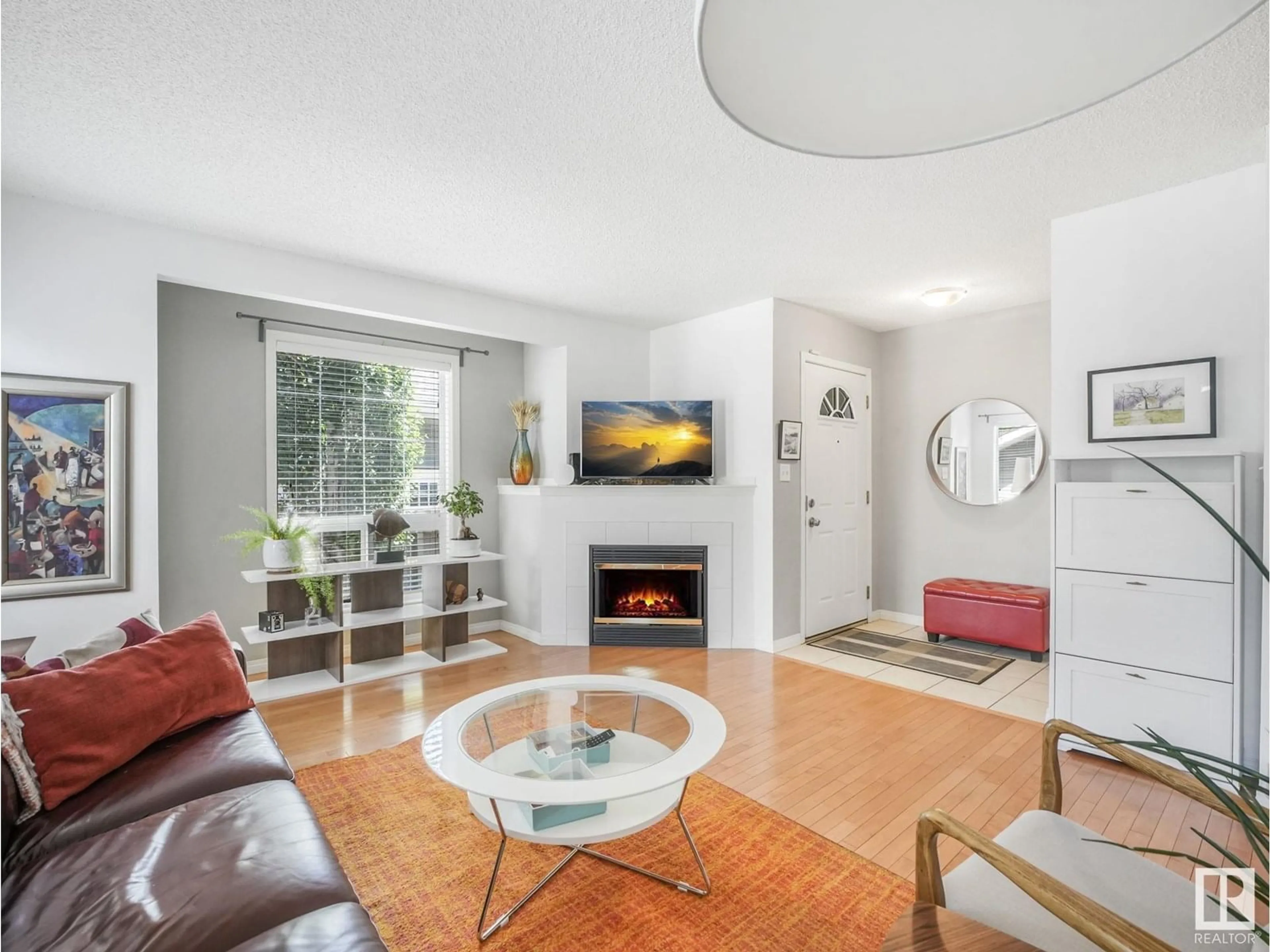 Living room with furniture, unknown for 14626 STONY PLAIN RD, Edmonton Alberta T5N3S2