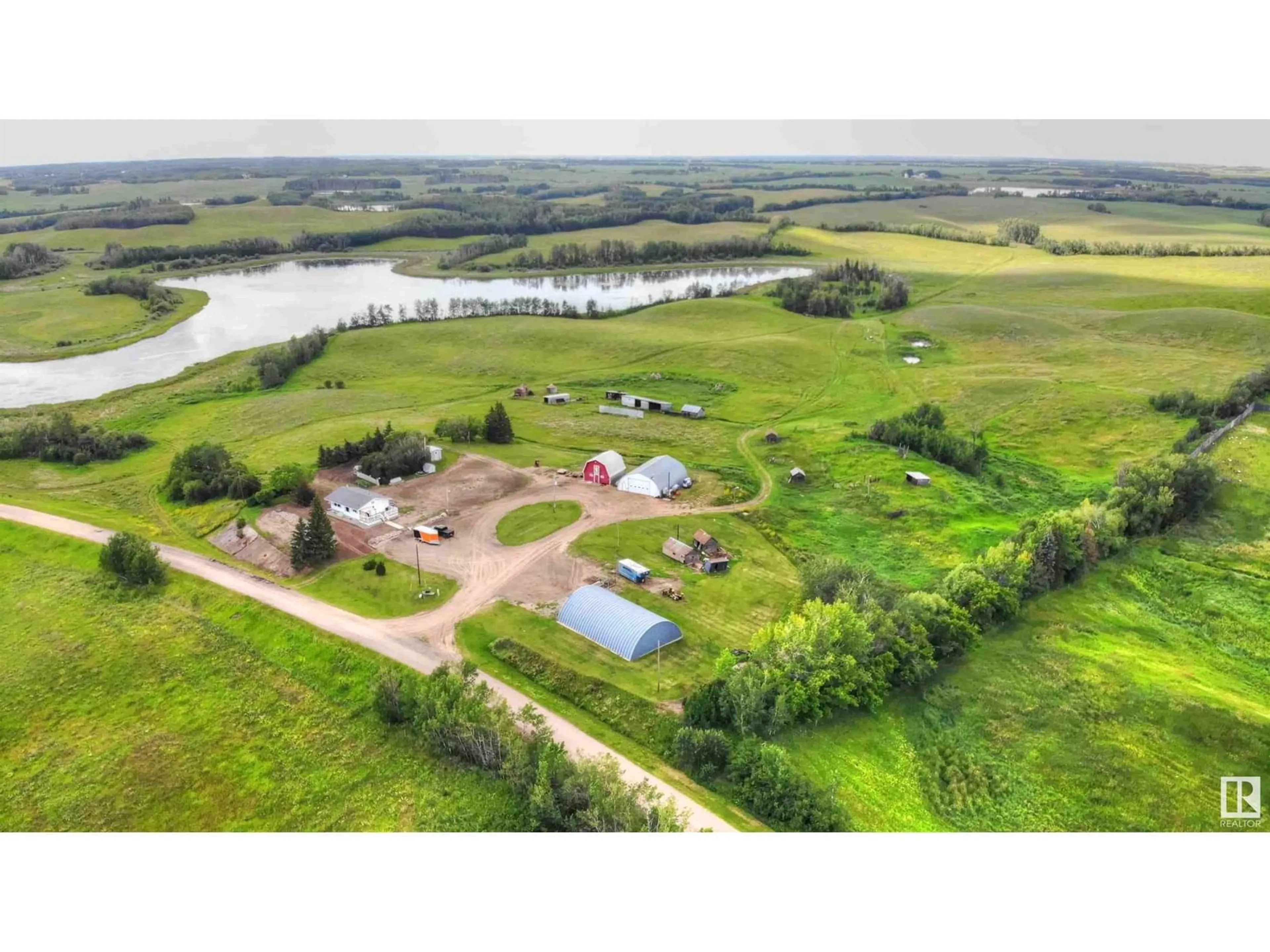 A pic from outside/outdoor area/front of a property/back of a property/a pic from drone, water/lake/river/ocean view for 8318 TWP RD 572, Rural St. Paul County Alberta T0A3A0