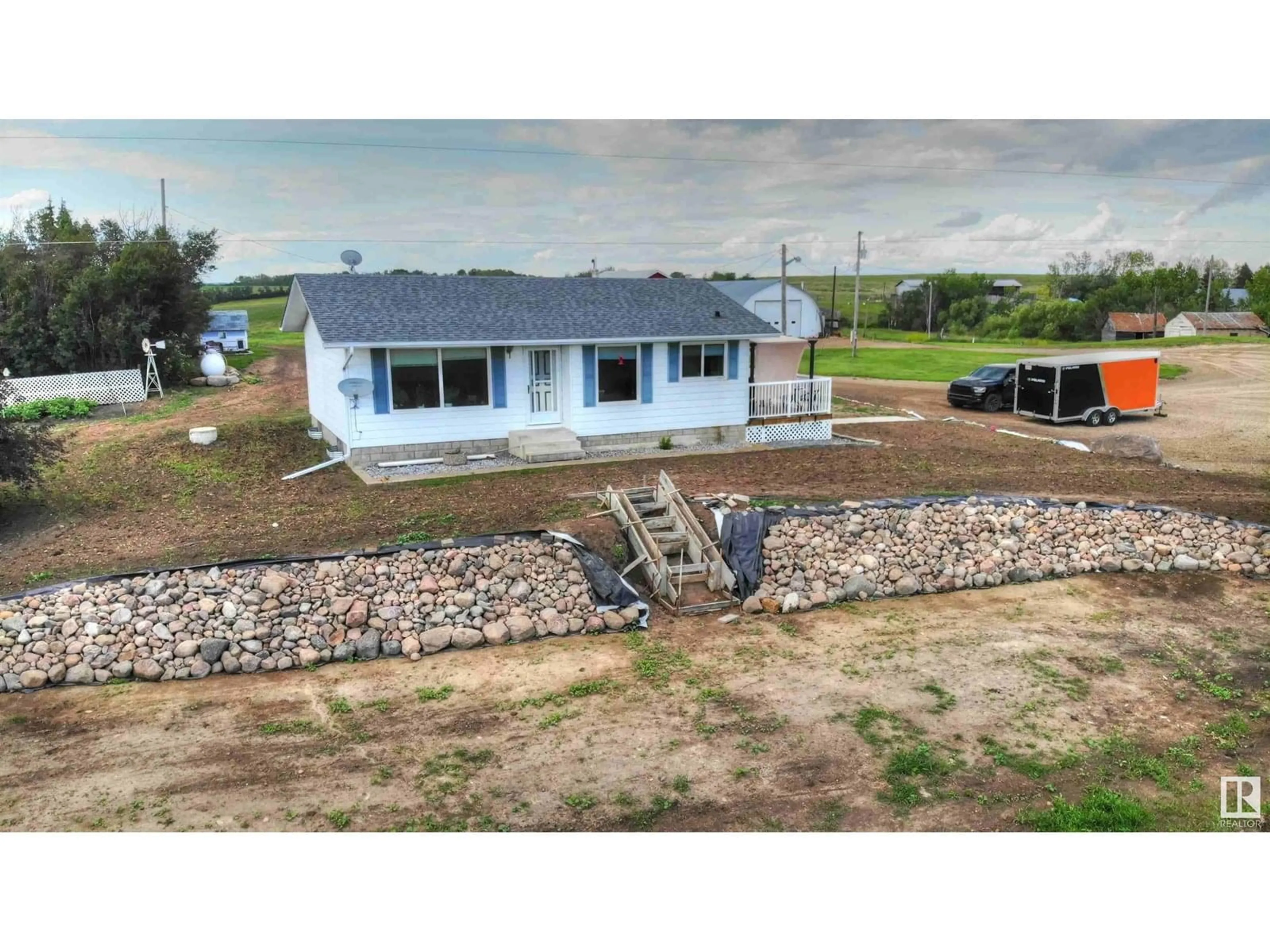 A pic from outside/outdoor area/front of a property/back of a property/a pic from drone, building for 8318 TWP RD 572, Rural St. Paul County Alberta T0A3A0
