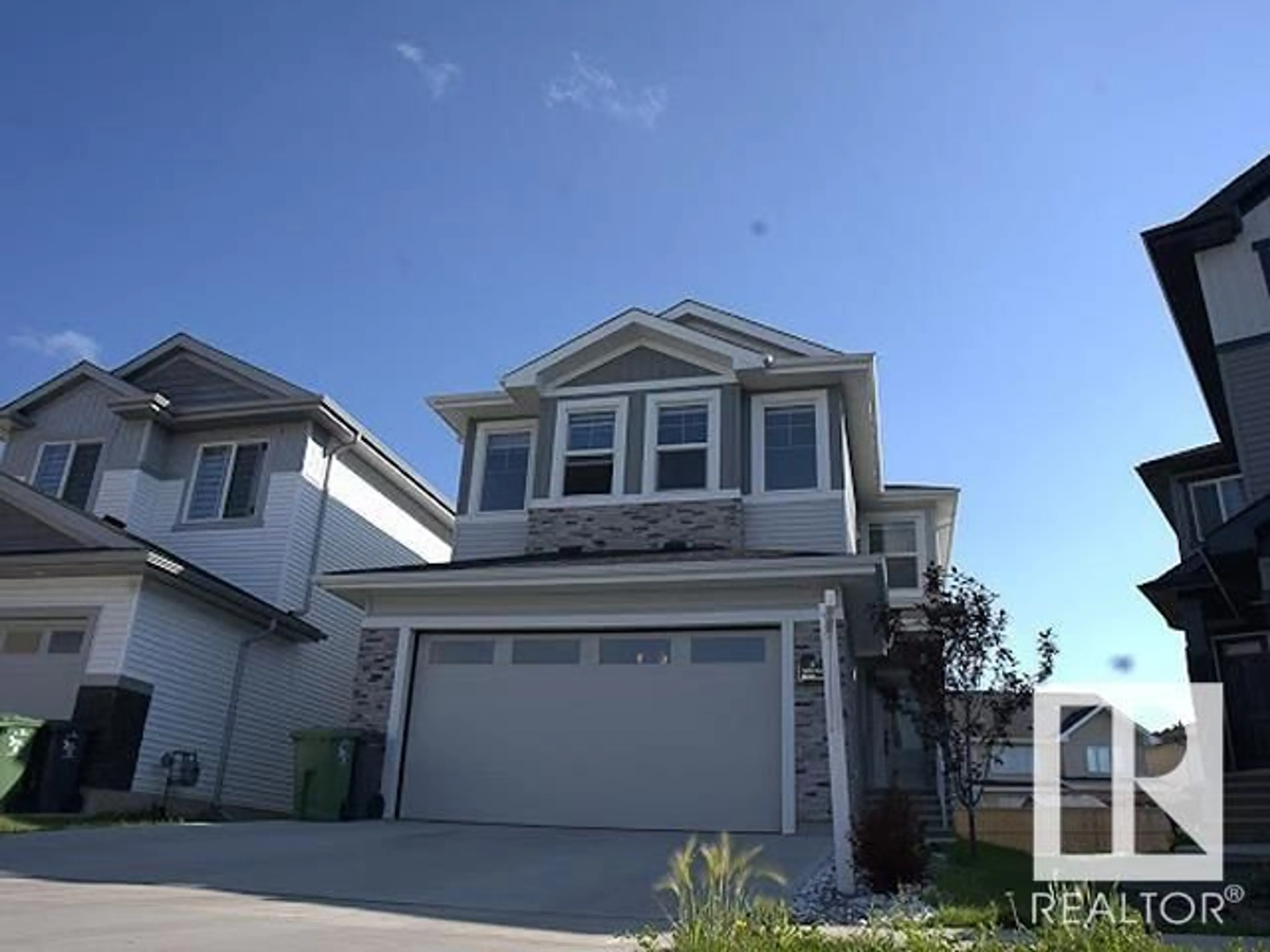 Home with vinyl exterior material, street for 5816 PELTIER CL, Beaumont Alberta T4X2Y1