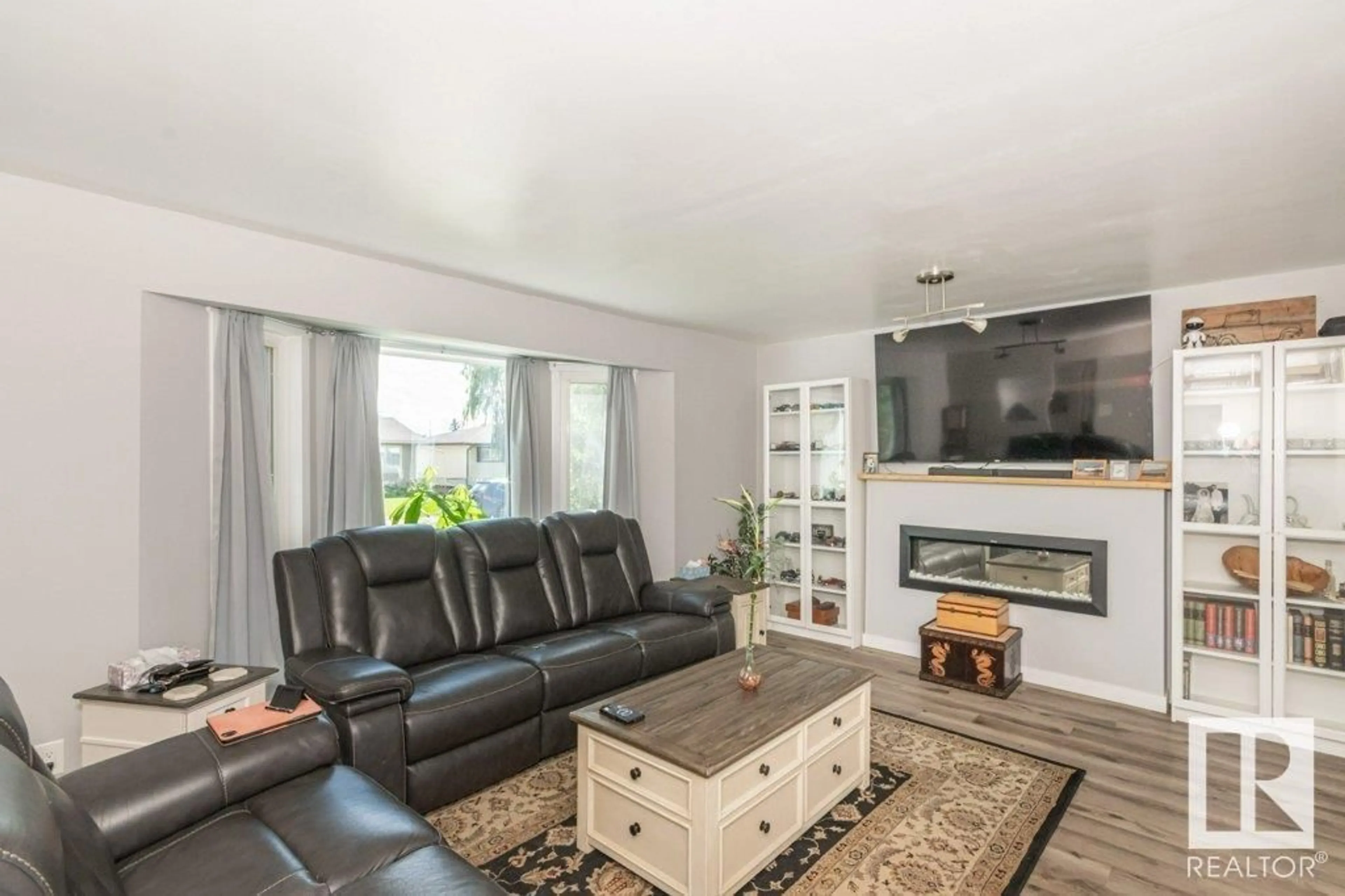 Living room with furniture, unknown for NW - 3506 122 AV, Edmonton Alberta T5W1P8