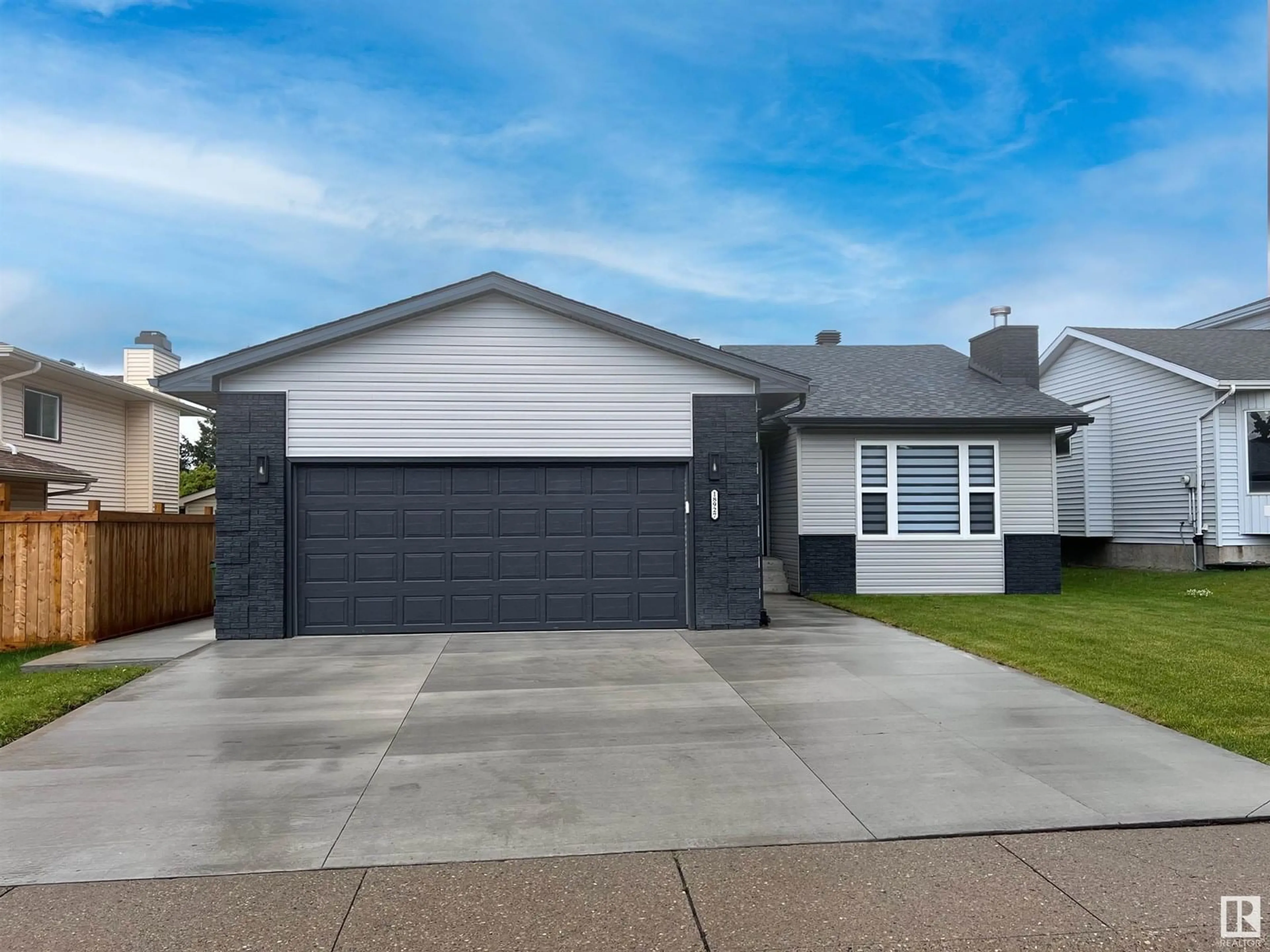 Home with vinyl exterior material, street for 18927 95A AV, Edmonton Alberta T5T5K9