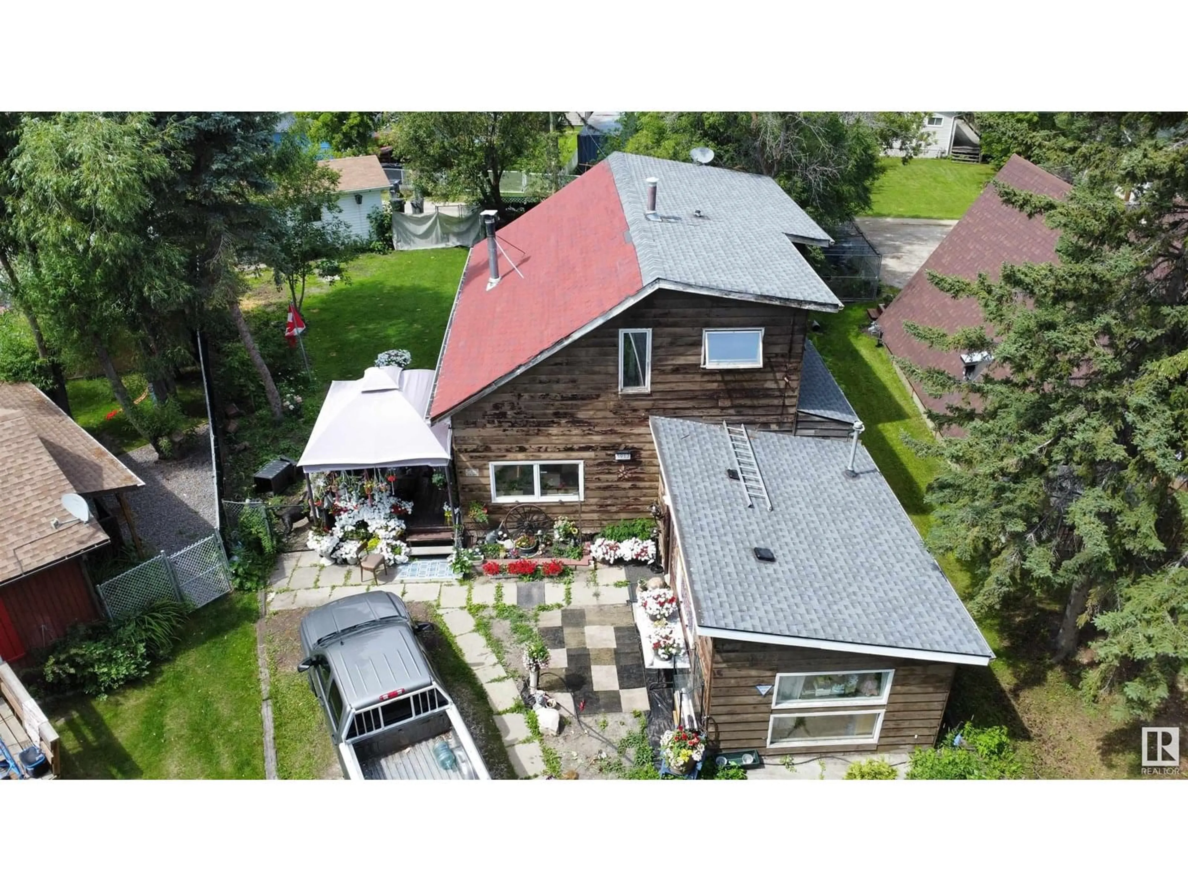 A pic from outside/outdoor area/front of a property/back of a property/a pic from drone, street for 5912 49 AV, Rural Lac Ste. Anne County Alberta T0E0A0
