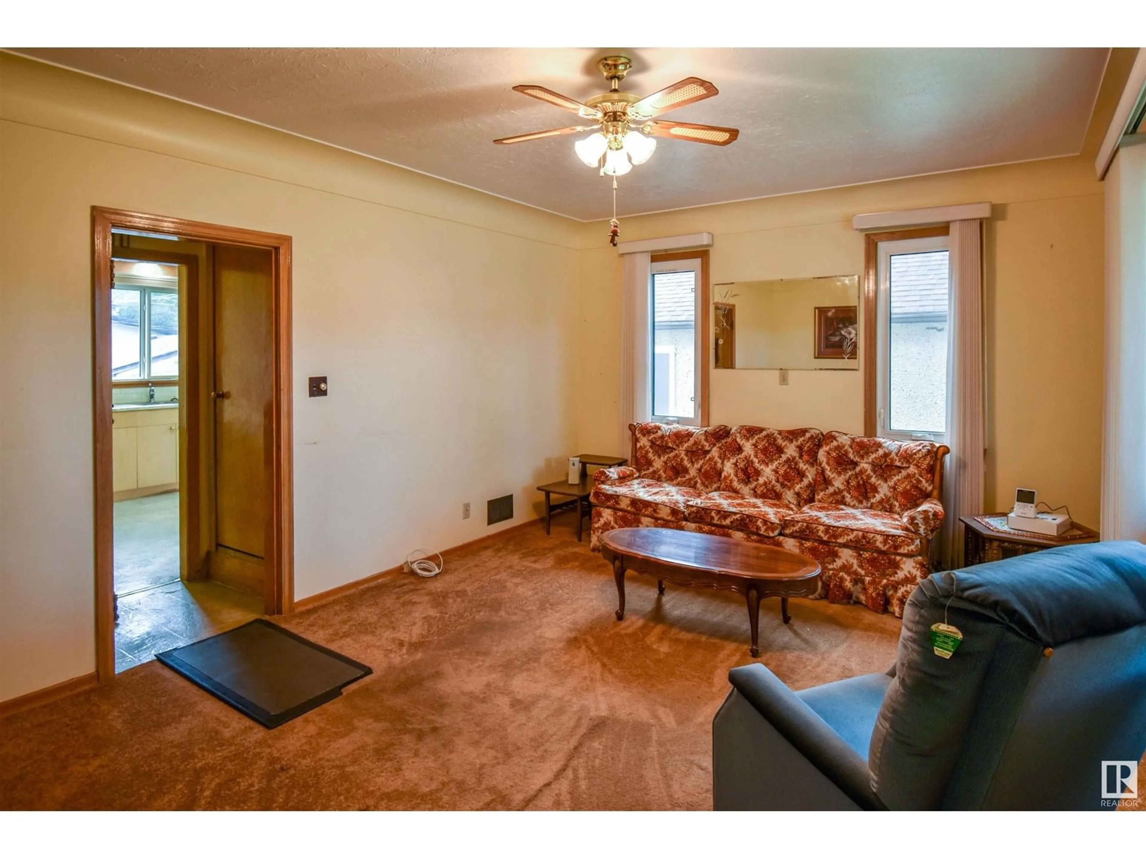 Living room with furniture, unknown for 12743 118 ST, Edmonton Alberta T5E5K9