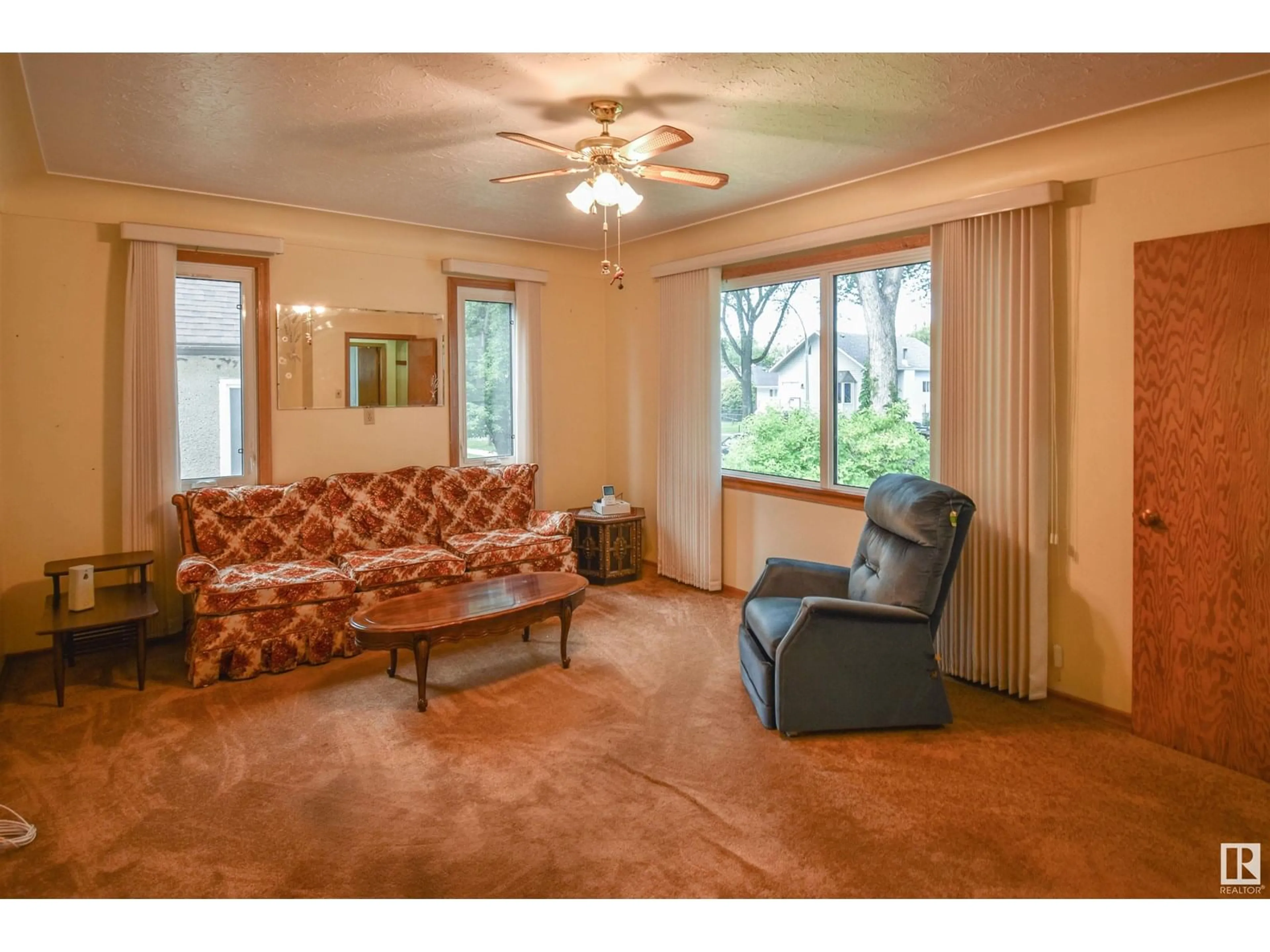 Living room with furniture, carpet floor for 12743 118 ST, Edmonton Alberta T5E5K9