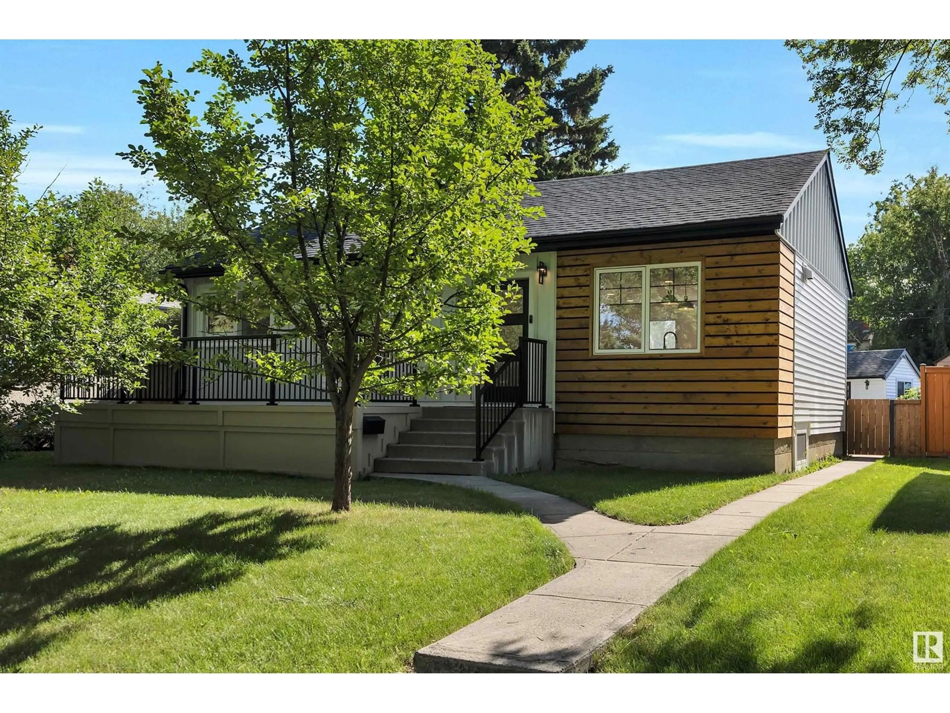 Home with vinyl exterior material, street for 8619 80 ST, Edmonton Alberta T6C2S8