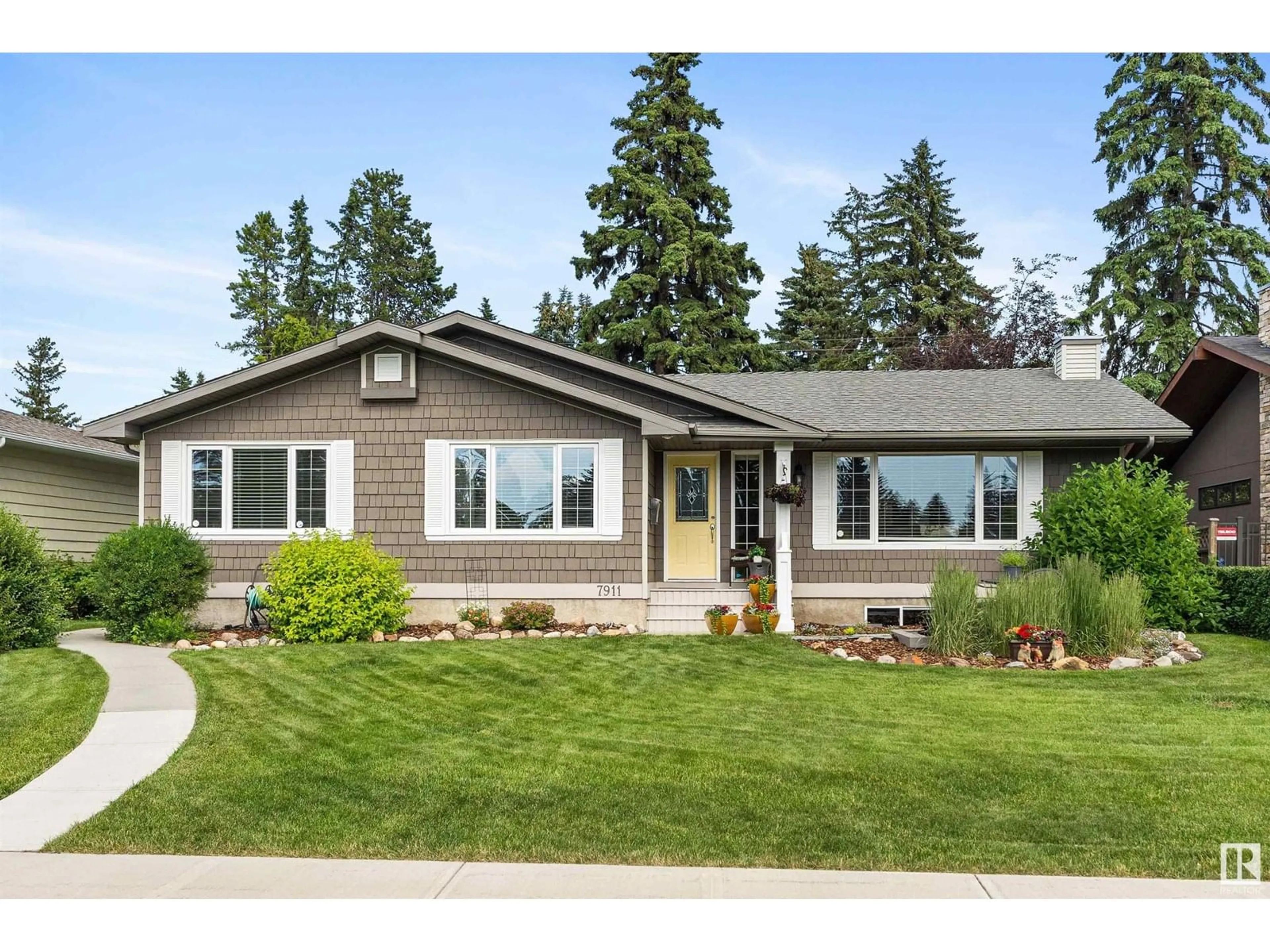 Home with vinyl exterior material, street for 7911 146 ST, Edmonton Alberta T5R0V5