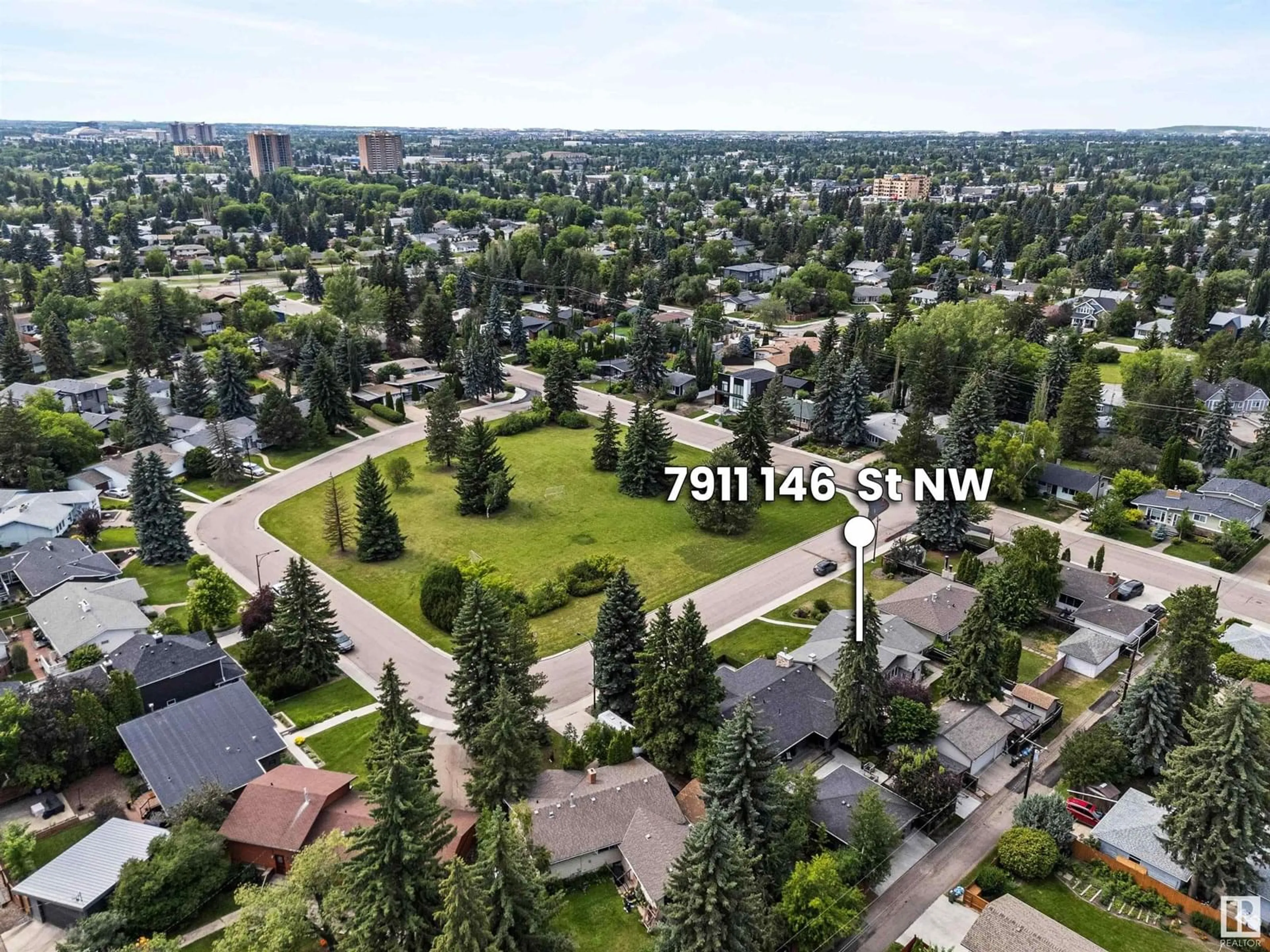 A pic from outside/outdoor area/front of a property/back of a property/a pic from drone, mountain view for 7911 146 ST, Edmonton Alberta T5R0V5