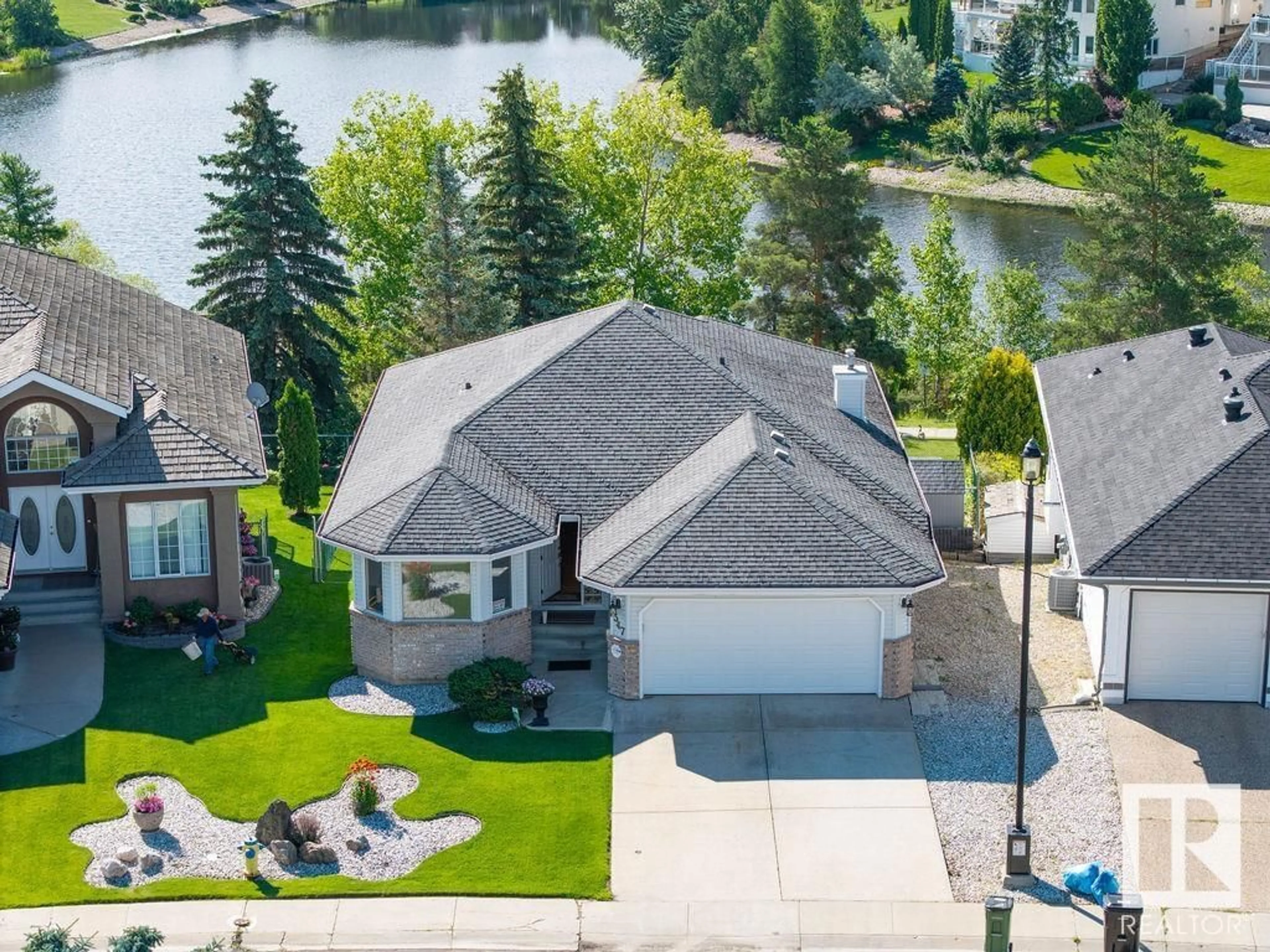 A pic from outside/outdoor area/front of a property/back of a property/a pic from drone, water/lake/river/ocean view for 547 TWIN BROOKS BA, Edmonton Alberta T6J6X3
