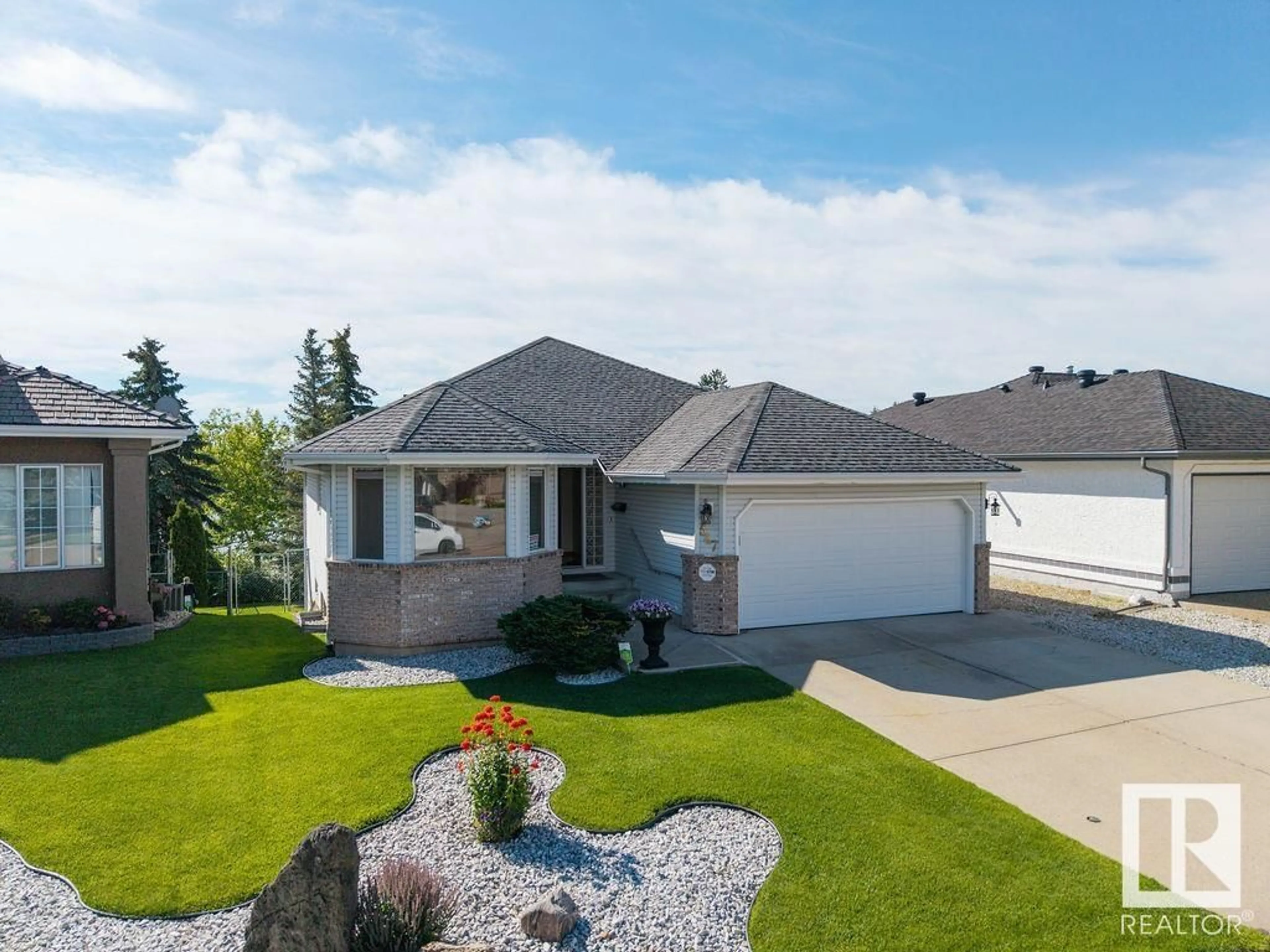 Home with vinyl exterior material, street for 547 TWIN BROOKS BA, Edmonton Alberta T6J6X3