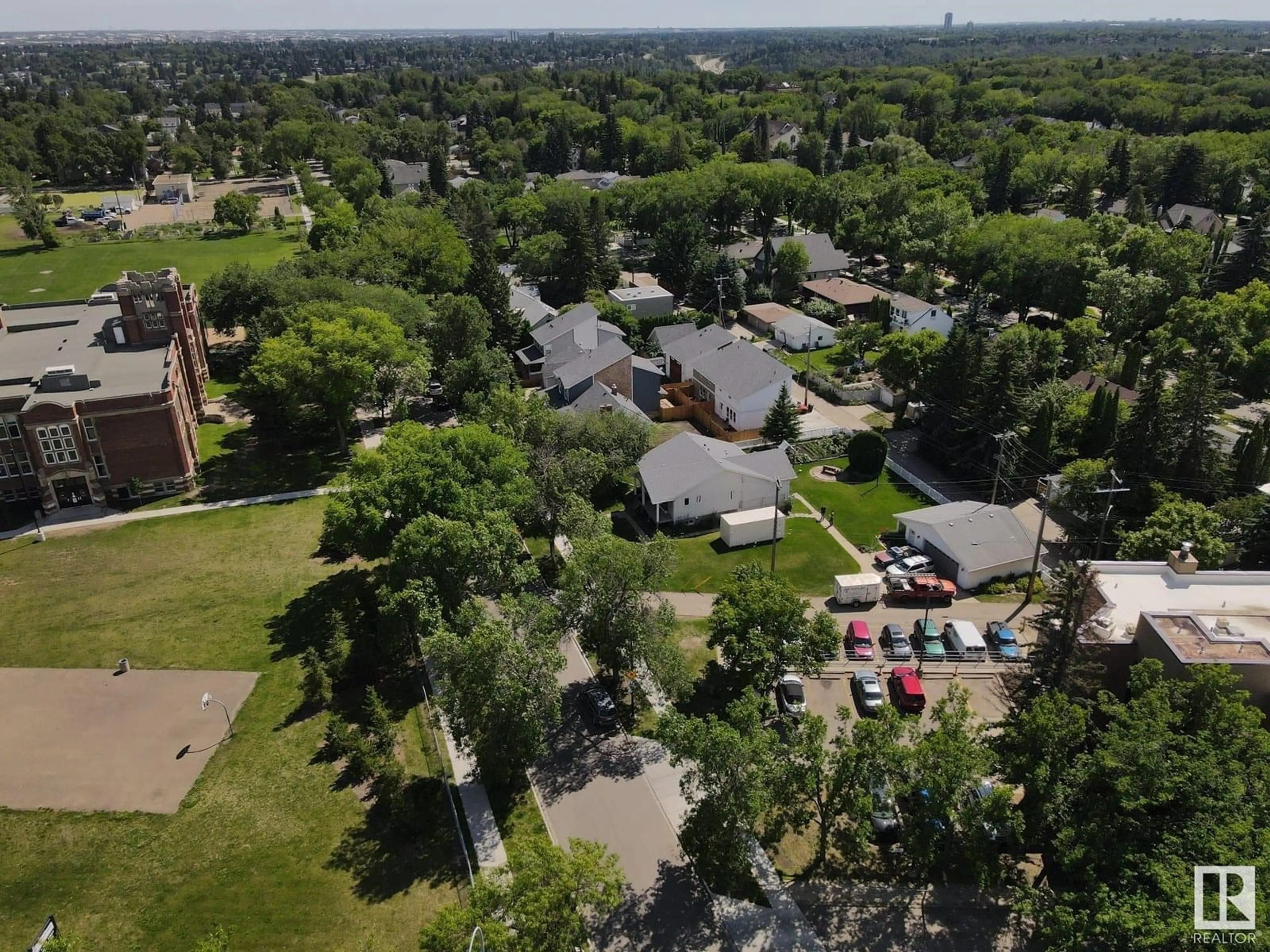 A pic from outside/outdoor area/front of a property/back of a property/a pic from drone, unknown for #1 - 6120 118 AV, Edmonton Alberta T5W1E8