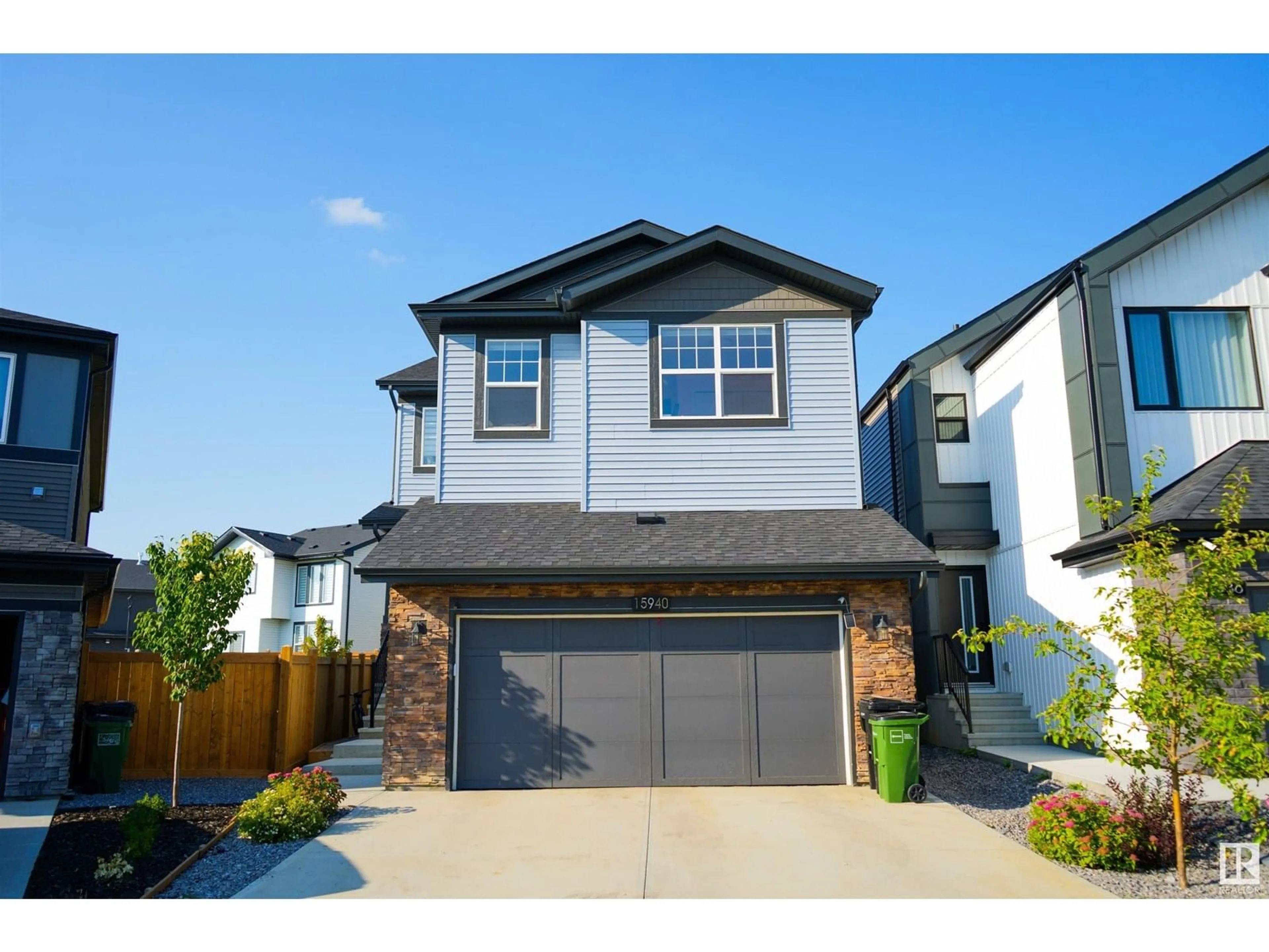 Home with vinyl exterior material, street for SW - 15940 19 AV, Edmonton Alberta T6W4X6