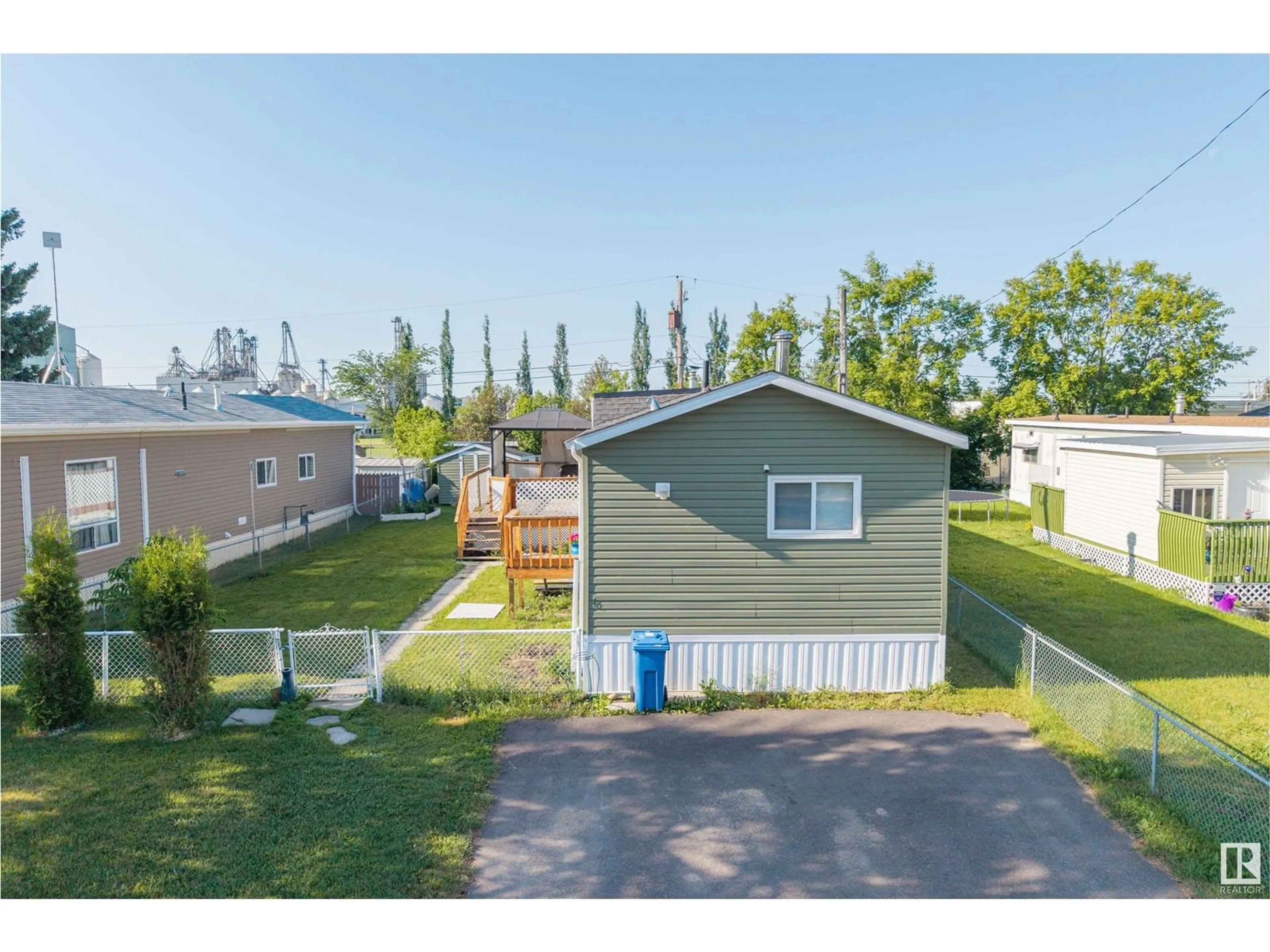 A pic from outside/outdoor area/front of a property/back of a property/a pic from drone, water/lake/river/ocean view for 67 4204 47 ST, Wetaskiwin Alberta T9A2H5