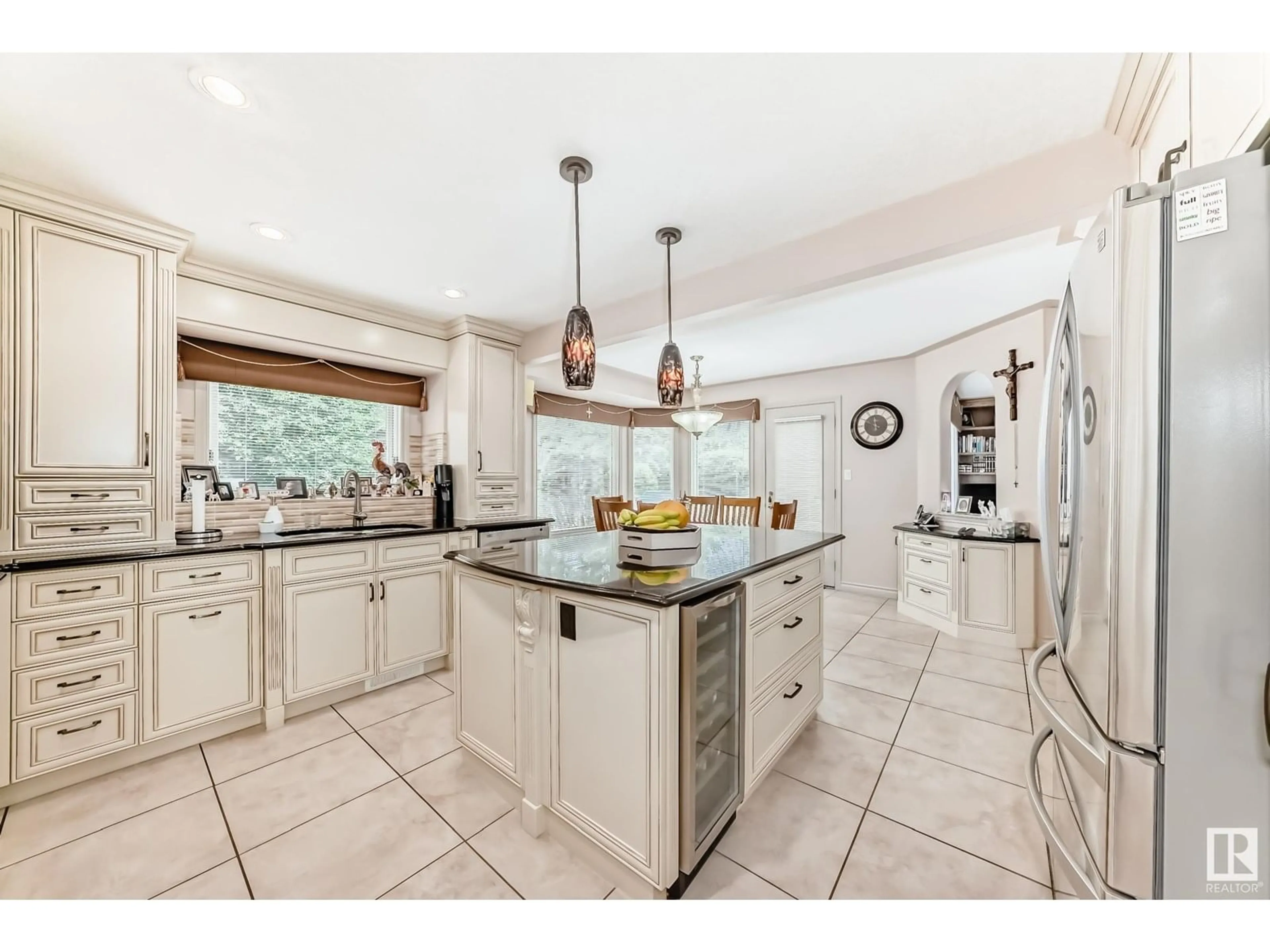 Open concept kitchen, ceramic/tile floor for 17416 53 AV, Edmonton Alberta T6M1C4