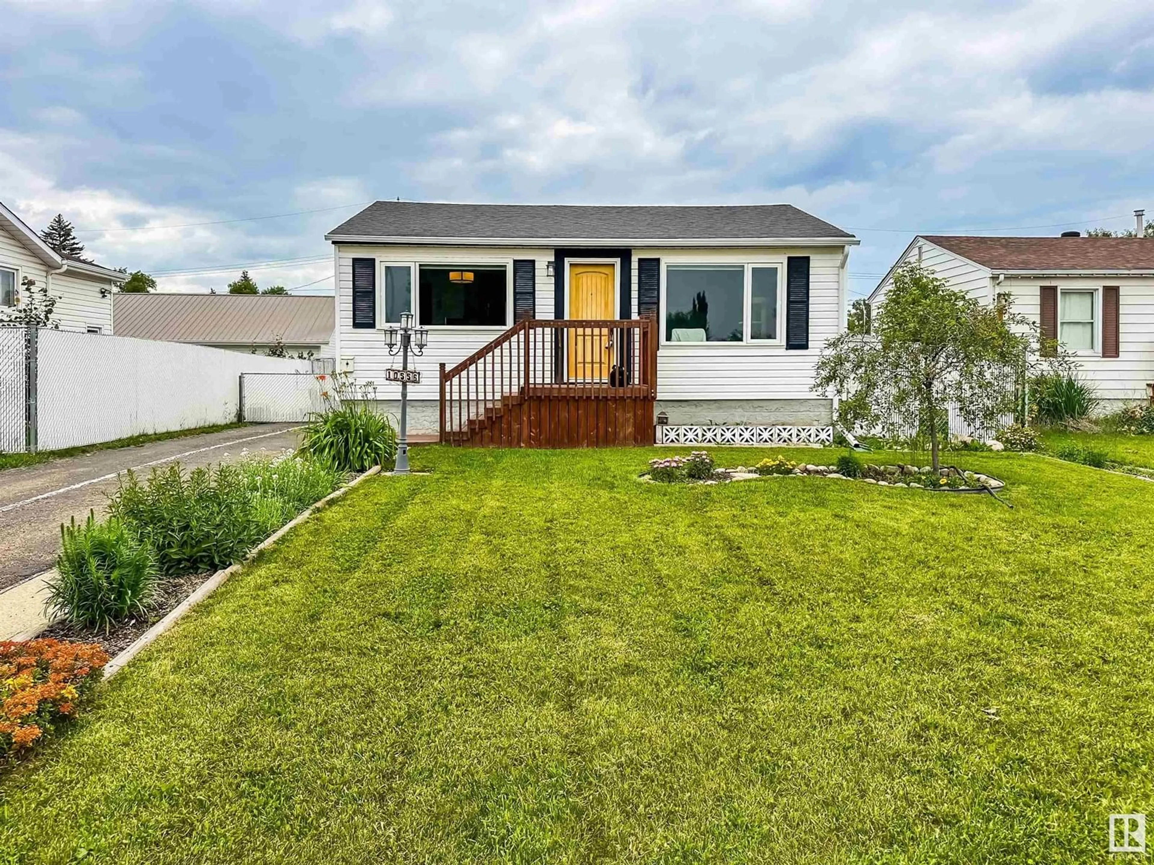 Home with vinyl exterior material, street for NW - 10556 162 ST, Edmonton Alberta T5P3M5