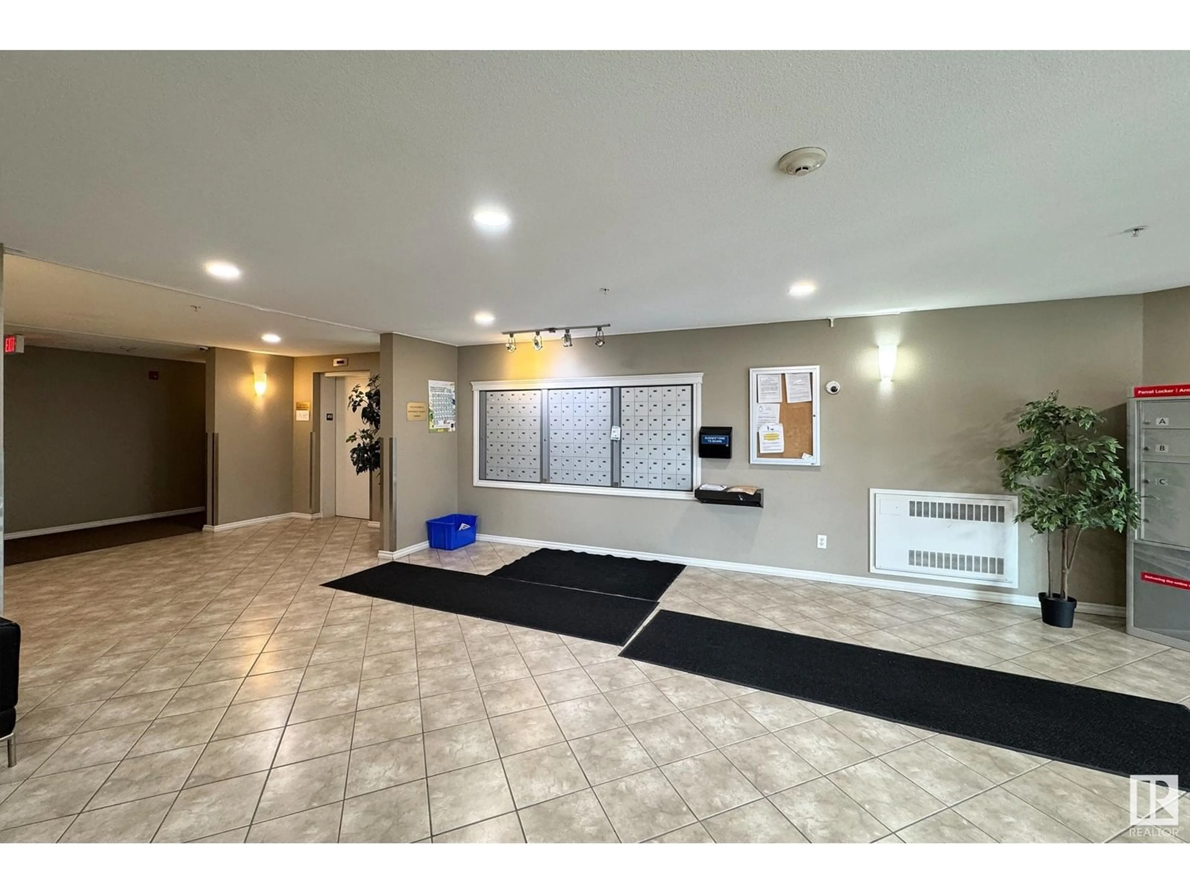 Indoor foyer for #118 - 5951 165 AV, Edmonton Alberta T5Y0J6
