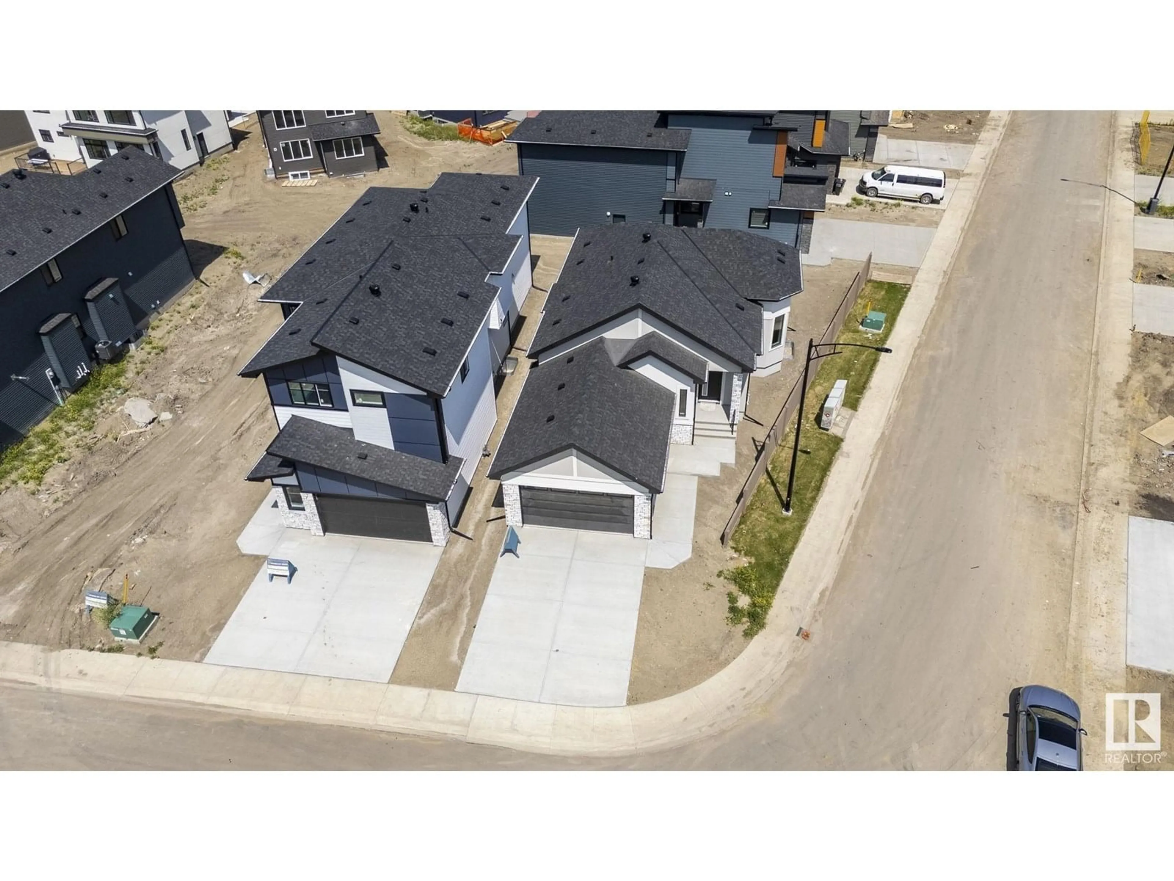 A pic from outside/outdoor area/front of a property/back of a property/a pic from drone, street for NE - 296 165 AV, Edmonton Alberta T5Y4J3