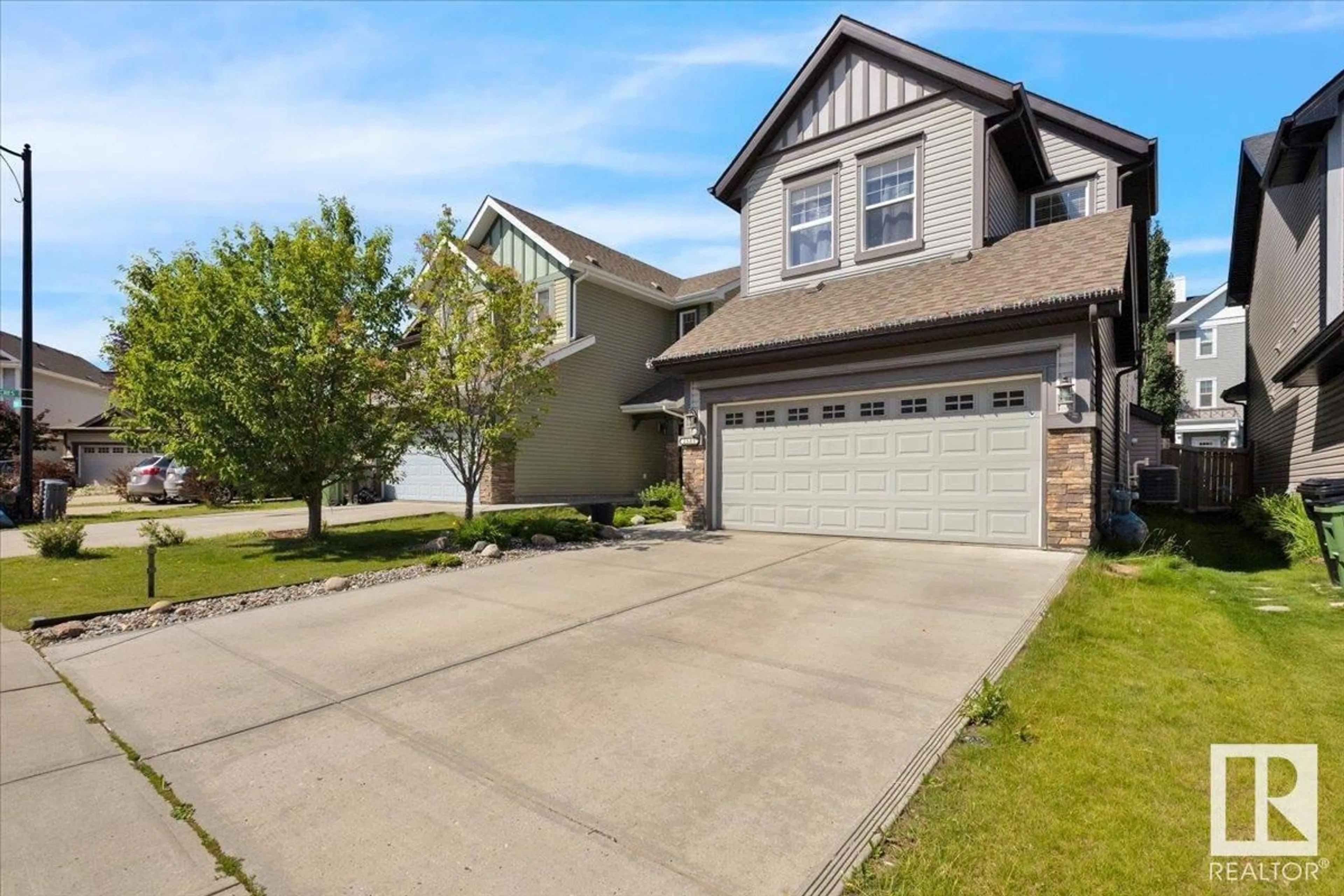 Home with vinyl exterior material, street for 2585 COLE CR, Edmonton Alberta T6W2A3