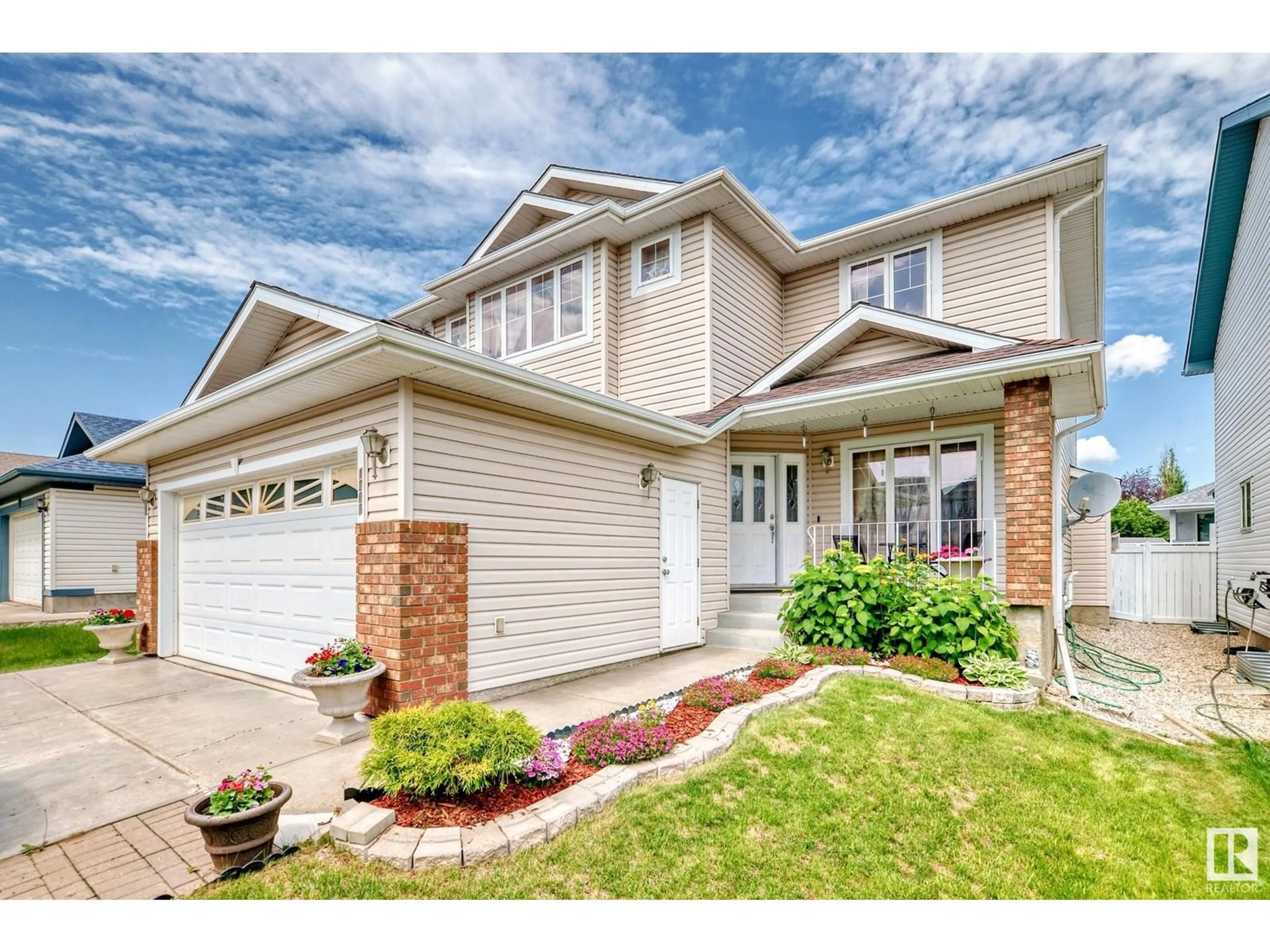 Home with vinyl exterior material, street for 1208 ORMSBY LN, Edmonton Alberta T5T6G8