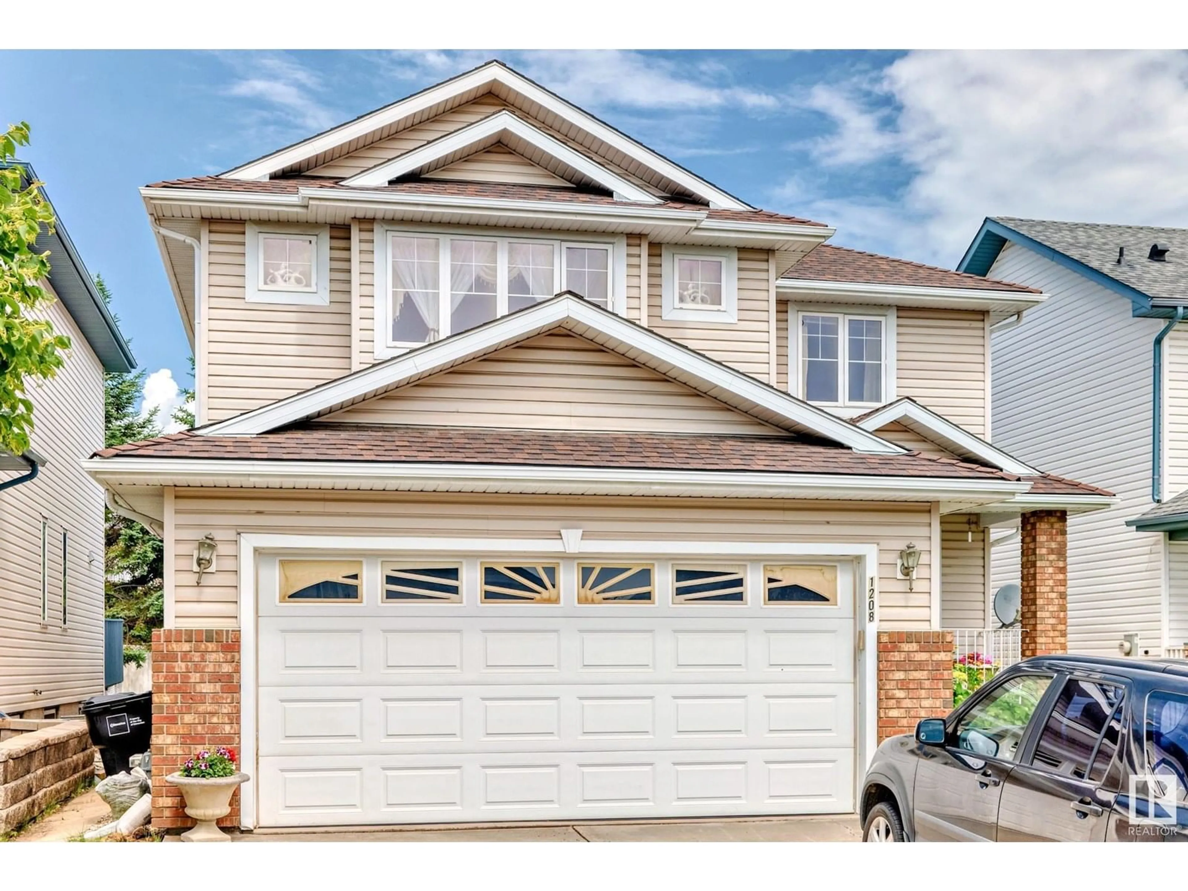 Home with vinyl exterior material, street for 1208 ORMSBY LN, Edmonton Alberta T5T6G8