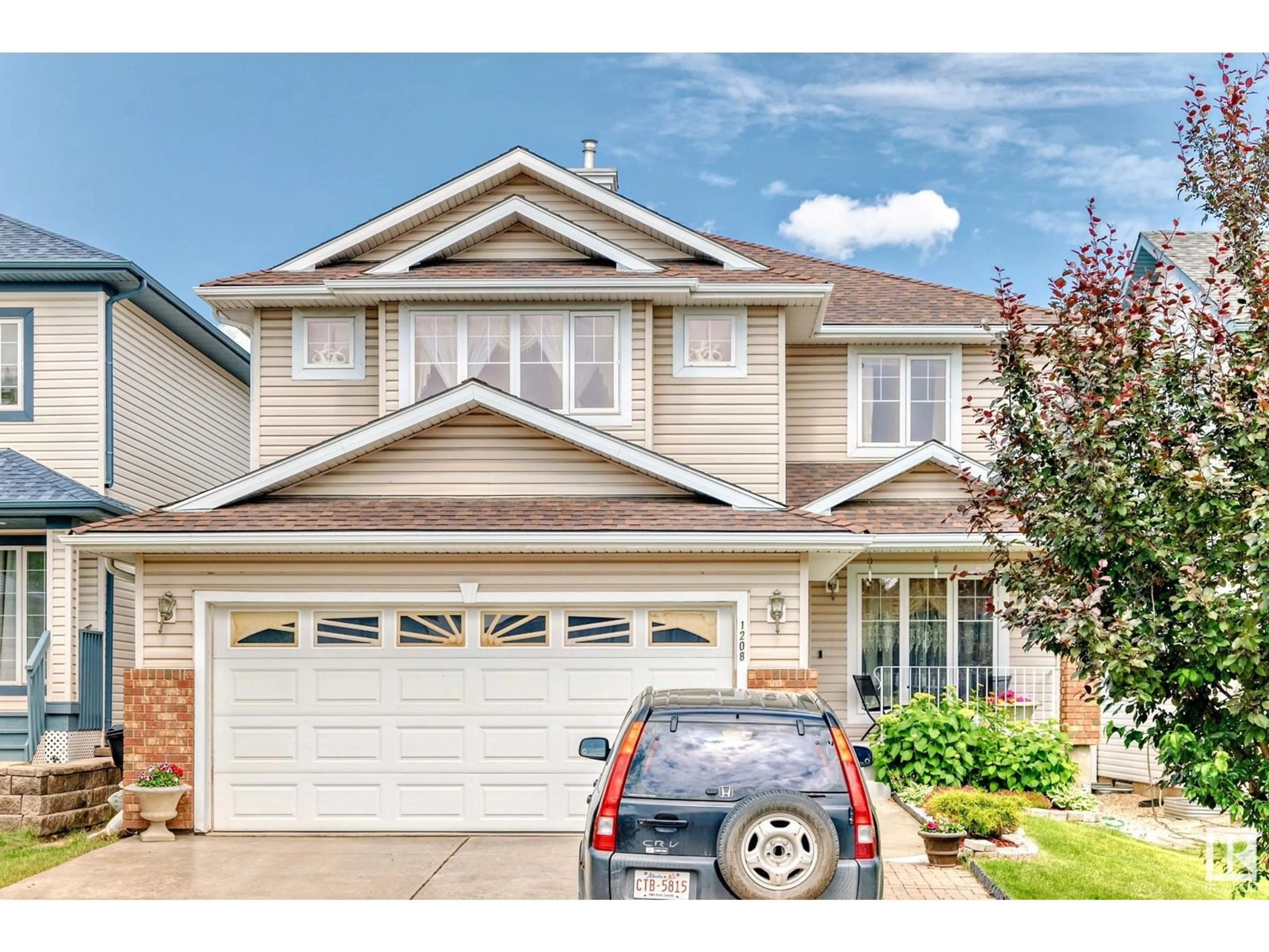 Home with vinyl exterior material, street for 1208 ORMSBY LN, Edmonton Alberta T5T6G8