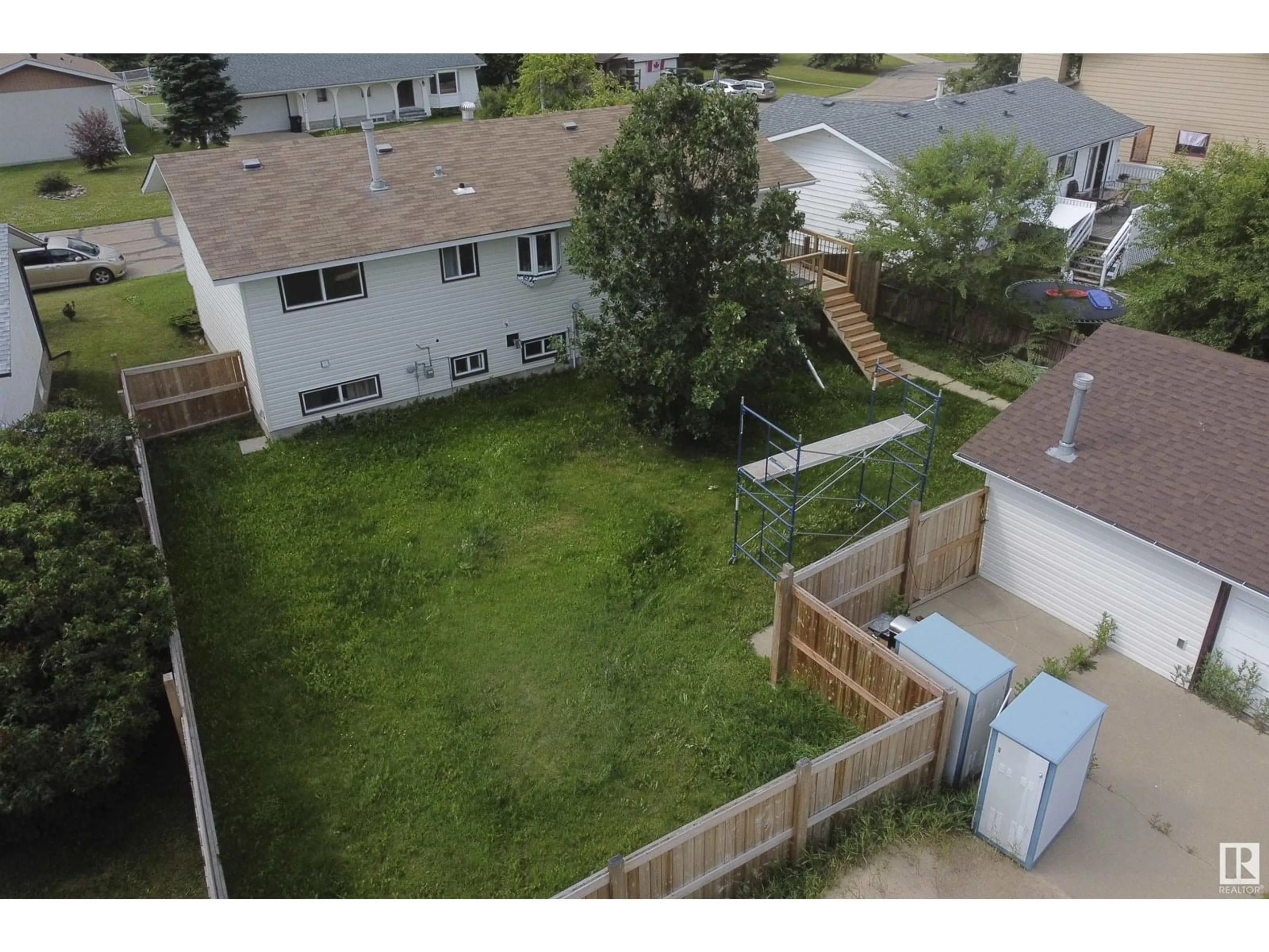 A pic from outside/outdoor area/front of a property/back of a property/a pic from drone, unknown for 5406 49 AV, Barrhead Alberta T7N1G2