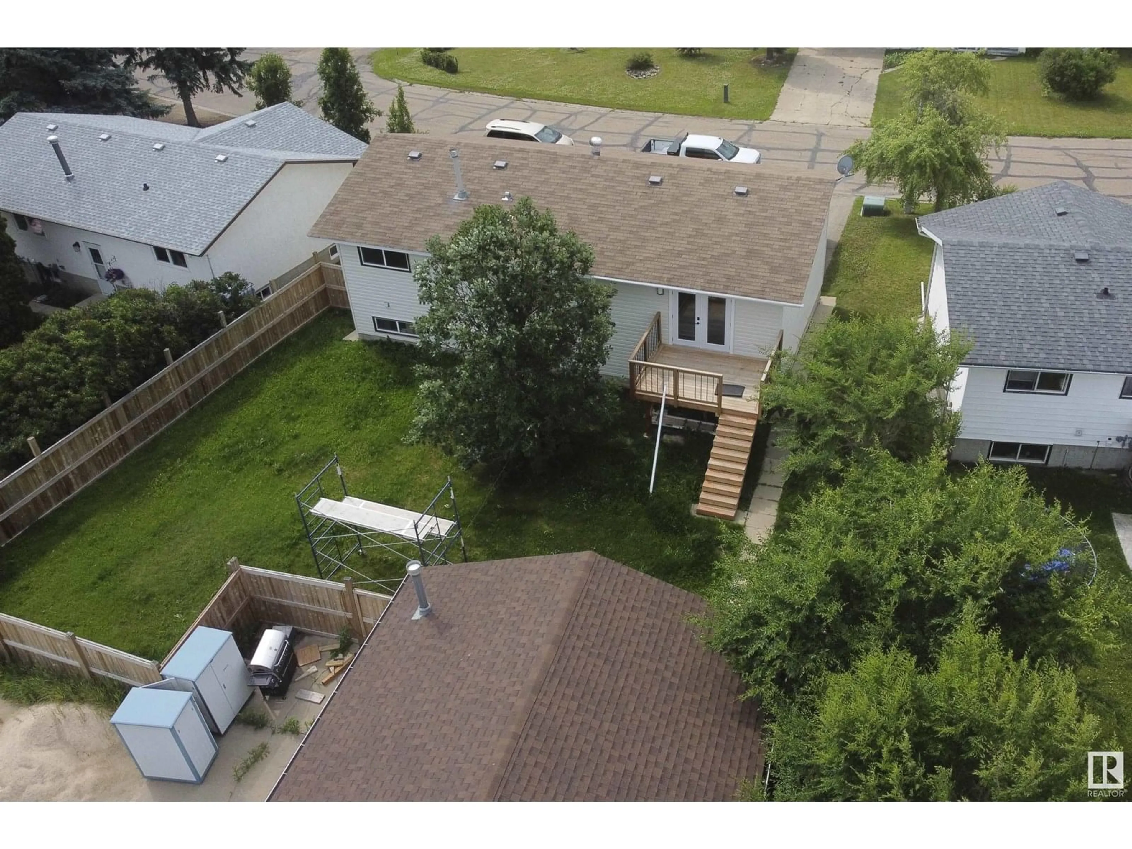 A pic from outside/outdoor area/front of a property/back of a property/a pic from drone, street for 5406 49 AV, Barrhead Alberta T7N1G2