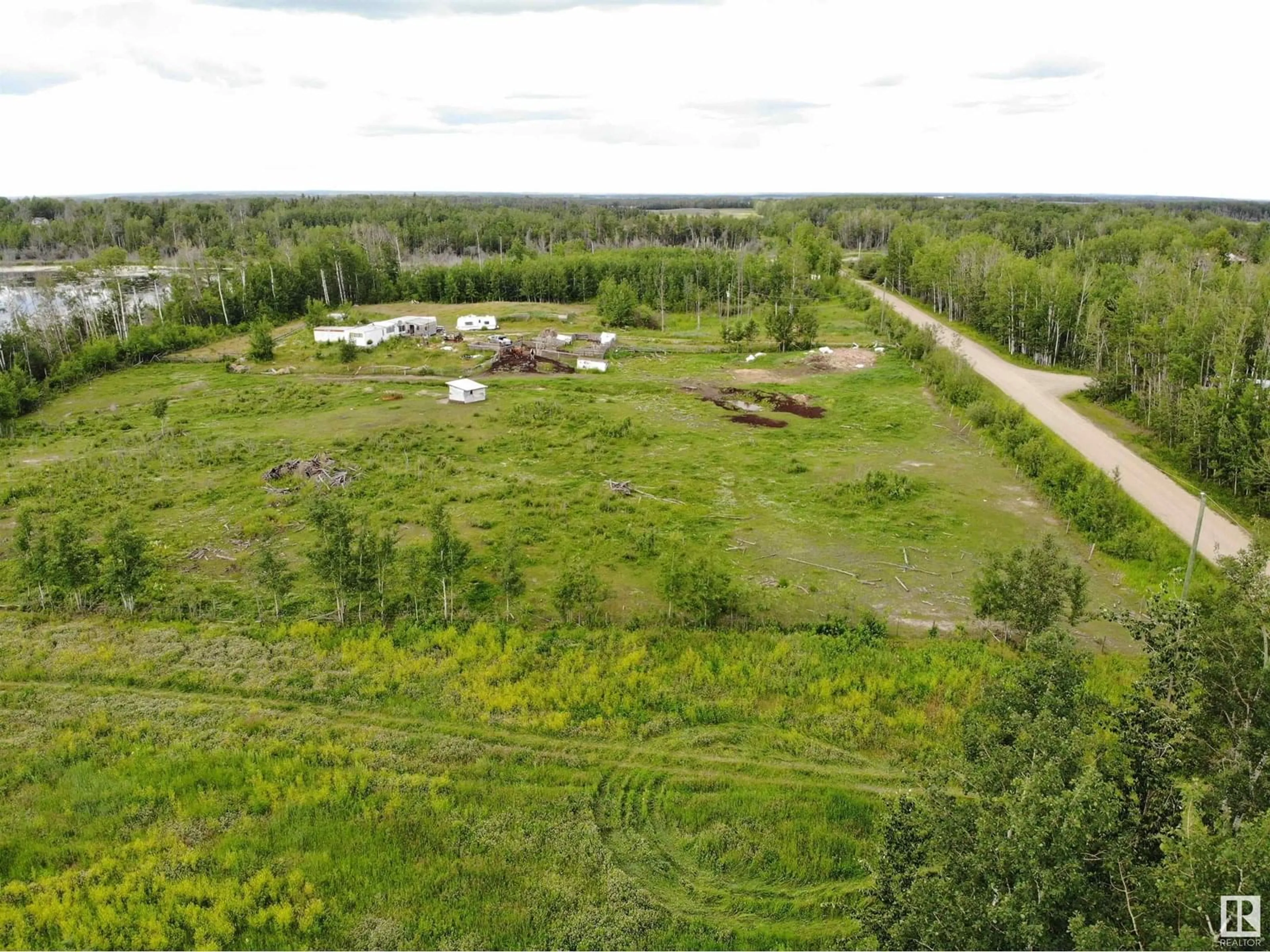 A pic from outside/outdoor area/front of a property/back of a property/a pic from drone, unknown for 58124 RGE RD 43, Rural Barrhead County Alberta T7N1N4