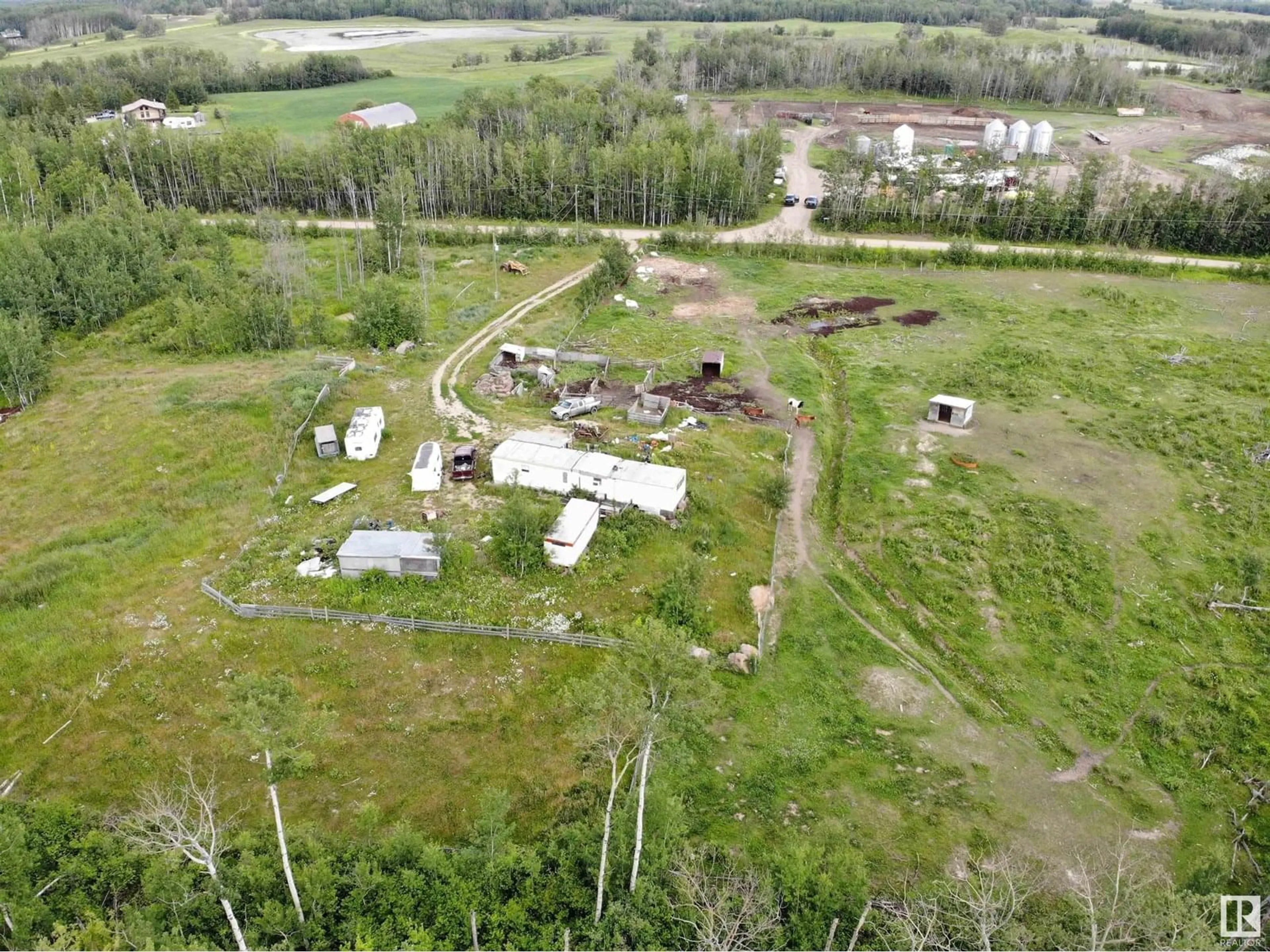 A pic from outside/outdoor area/front of a property/back of a property/a pic from drone, building for 58124 RGE RD 43, Rural Barrhead County Alberta T7N1N4
