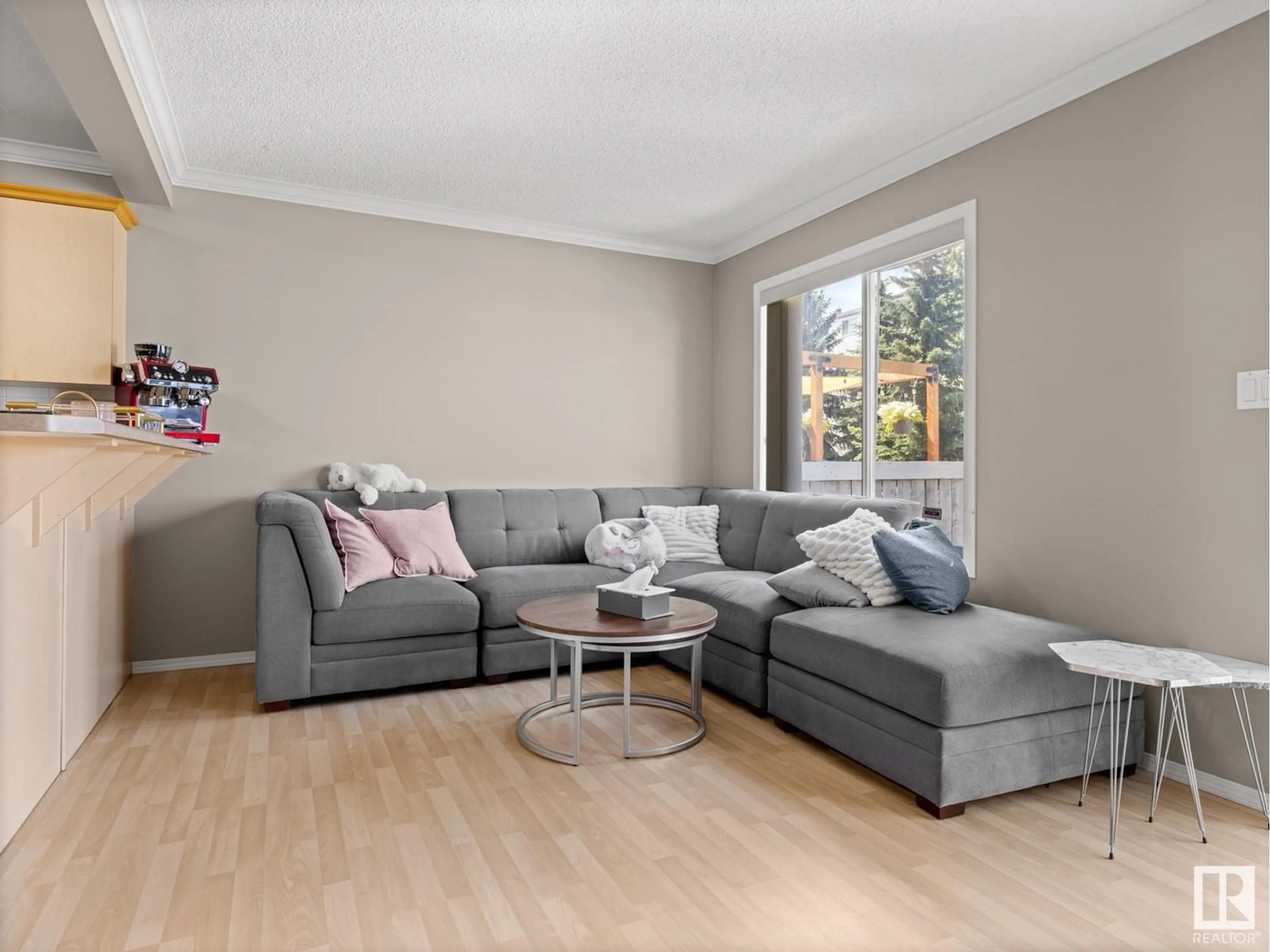 Living room with furniture, wood/laminate floor for NW - 3718 138A AV, Edmonton Alberta T5Y3G5