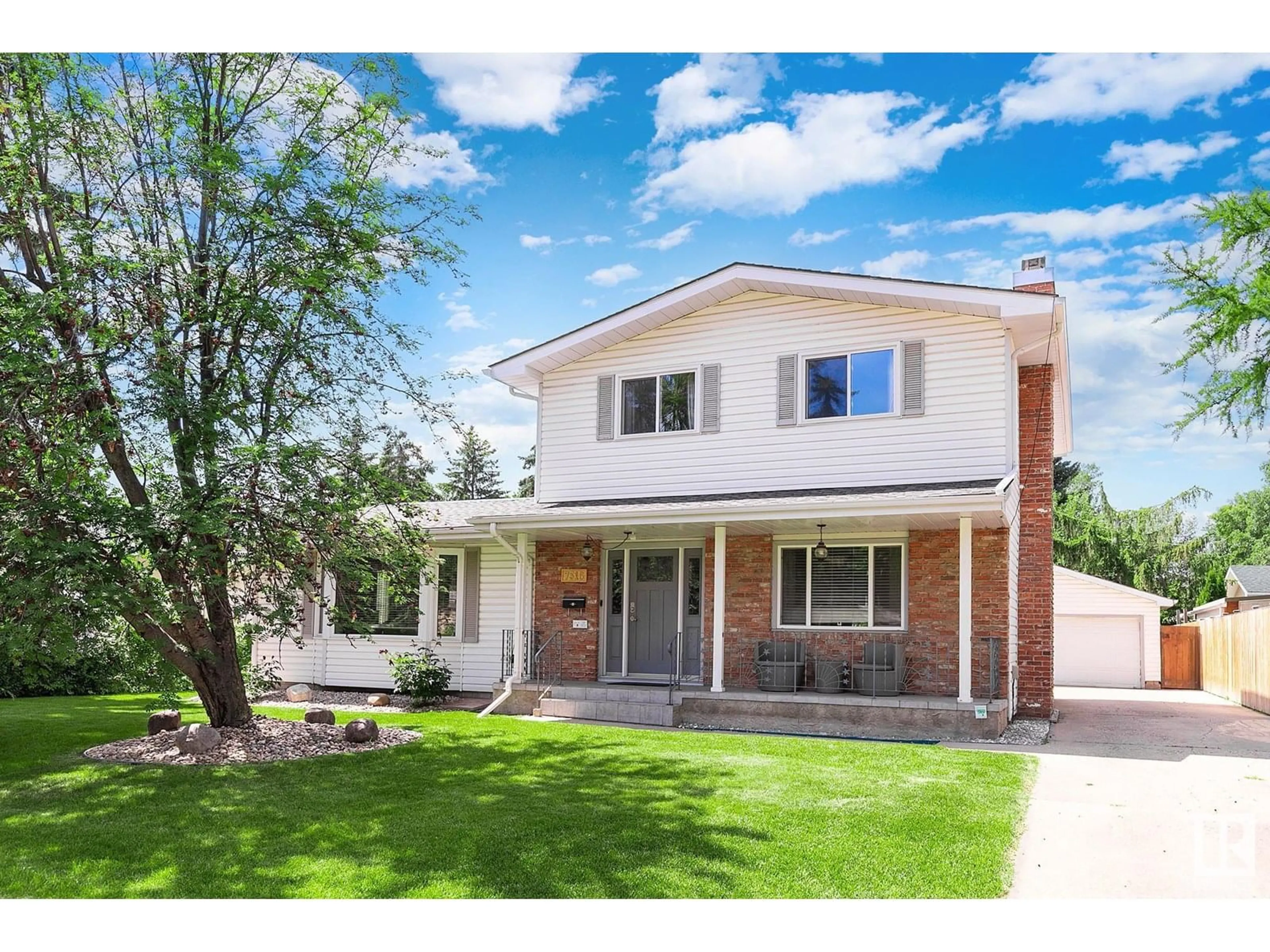 Home with vinyl exterior material, street for NW - 7316 156 ST, Edmonton Alberta T5R1X3